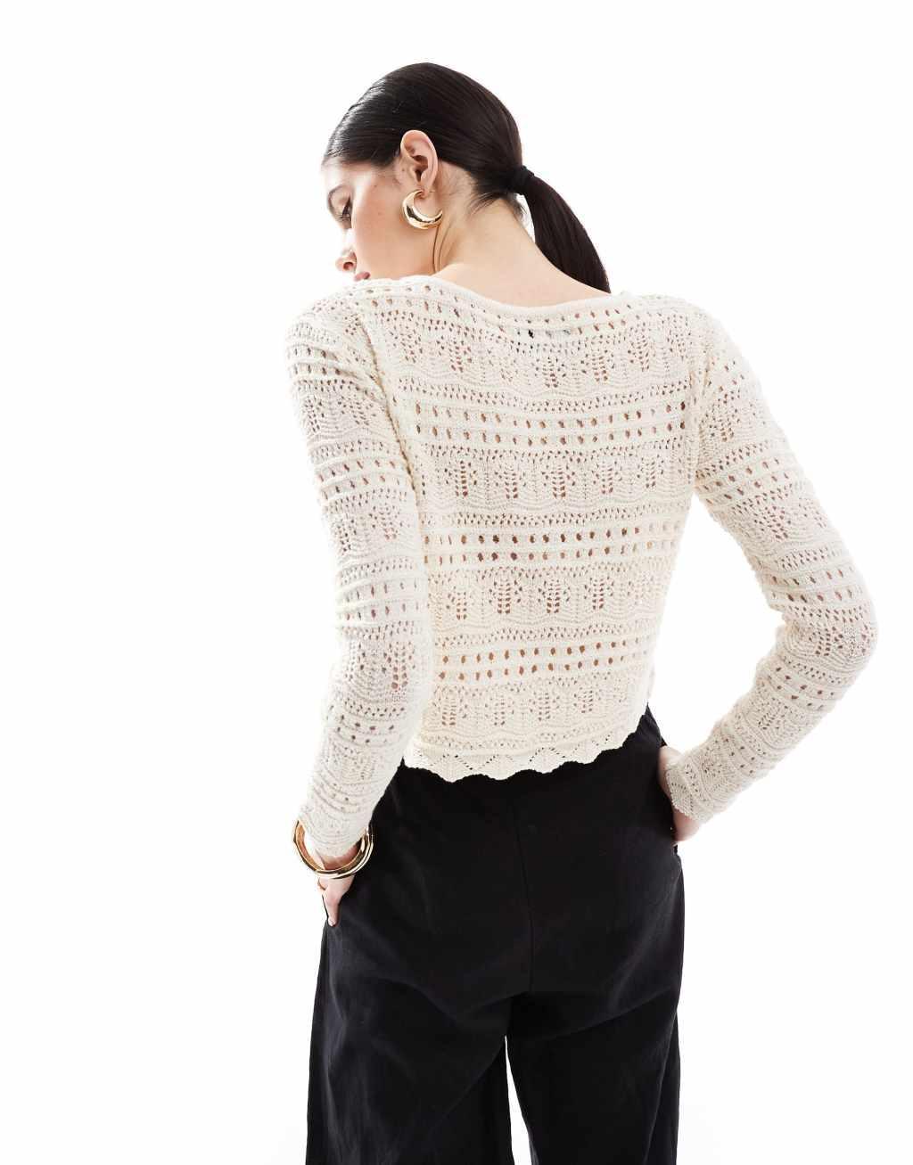 ASOS DESIGN crew neck mixed stitch sweater with scalloped hem in cream Product Image