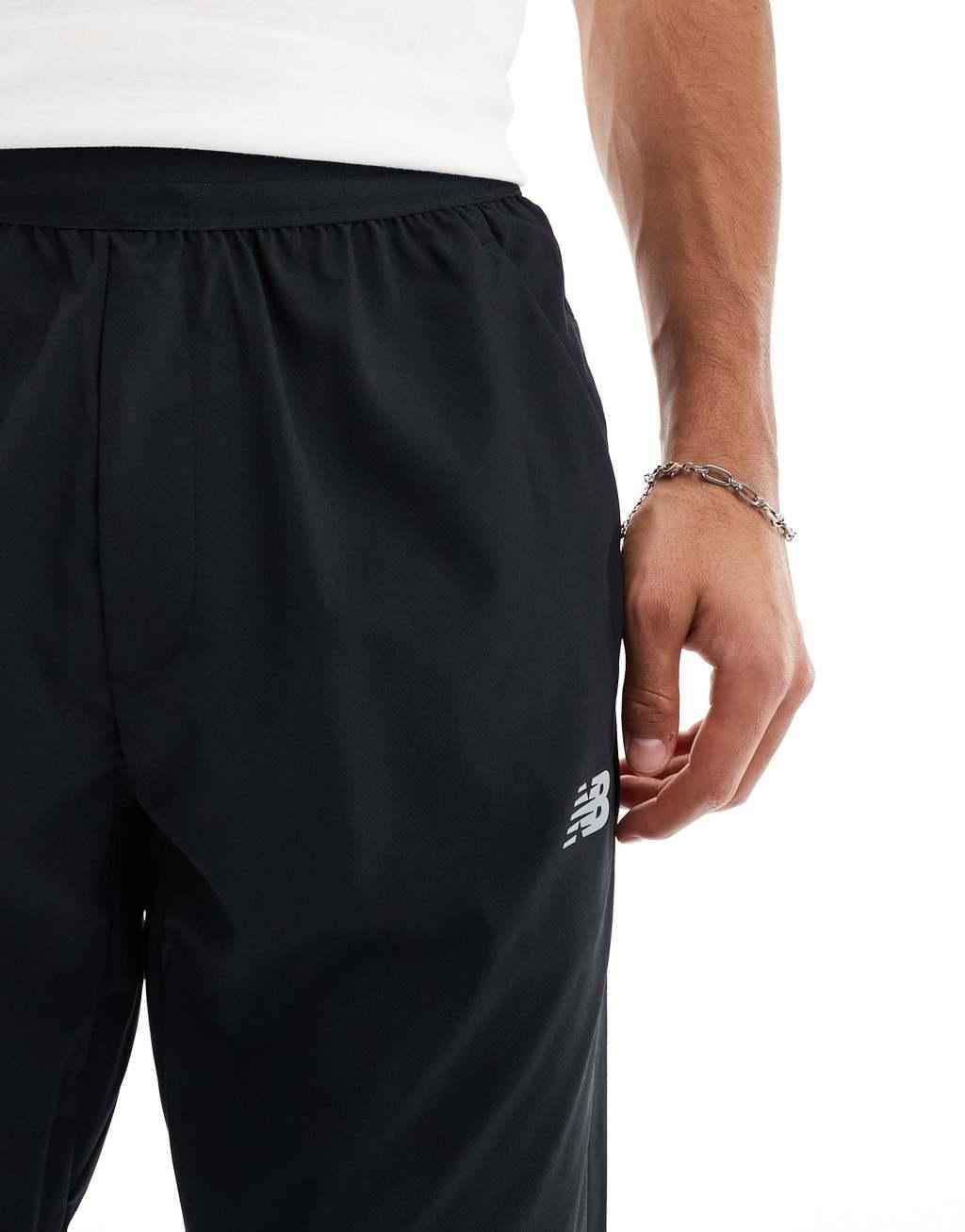 New Balance sport AC tapered track pants in black Product Image