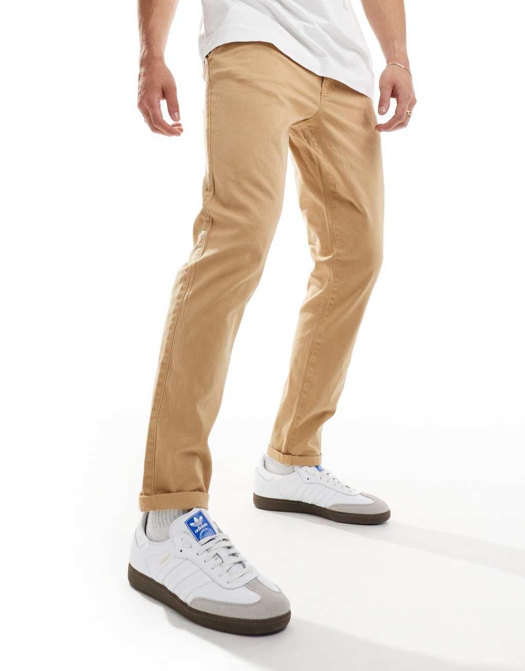 ASOS DESIGN tapered washed chinos in tan Product Image