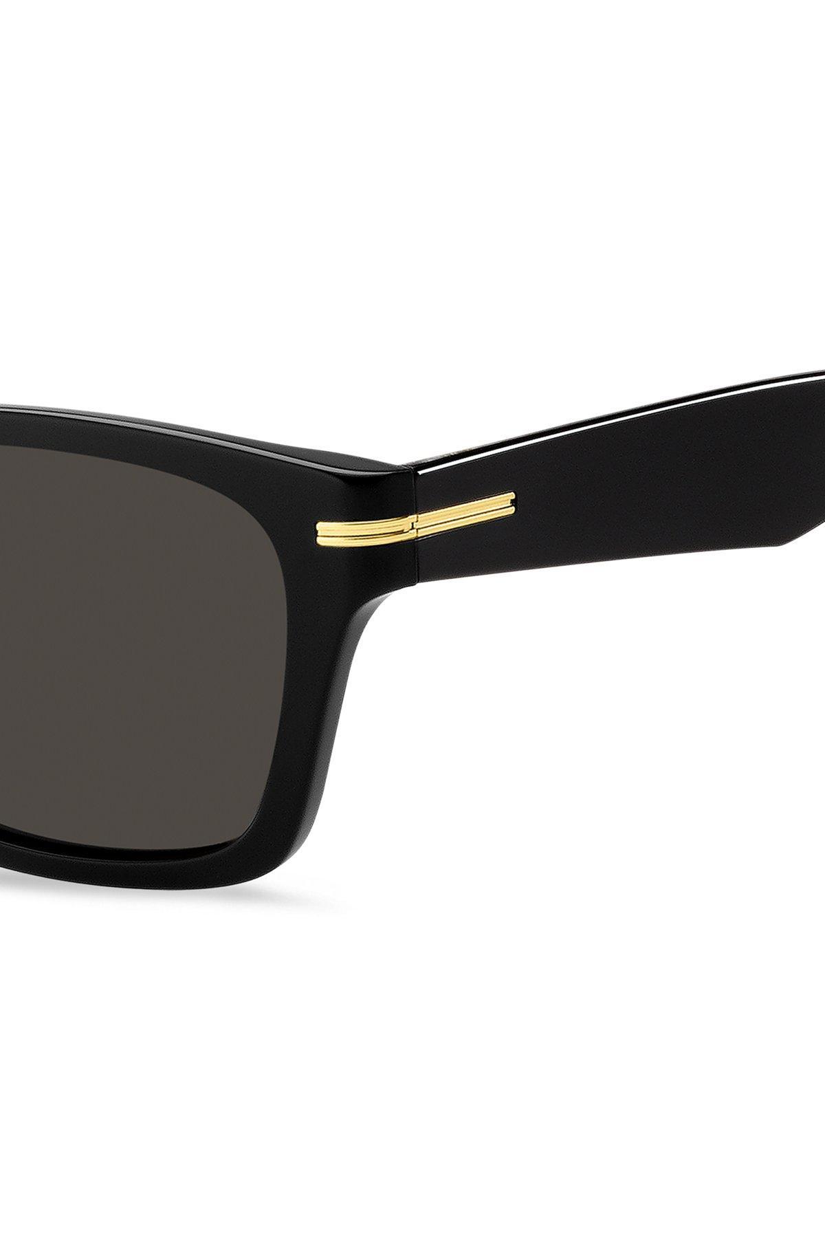 Black-acetate sunglasses with gold-tone hinges Product Image