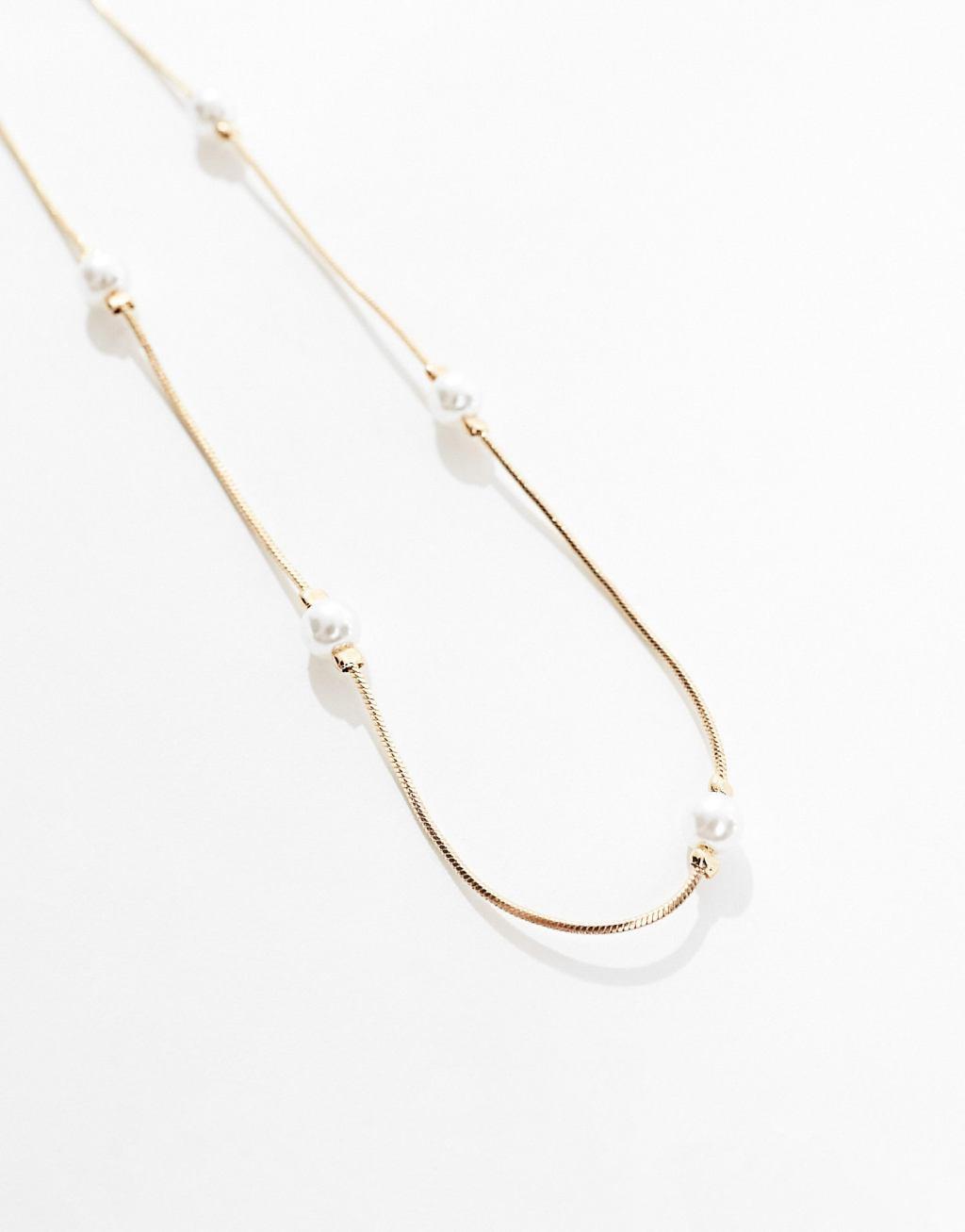 ASOS DESIGN belly chain with faux pearl design in gold tone Product Image