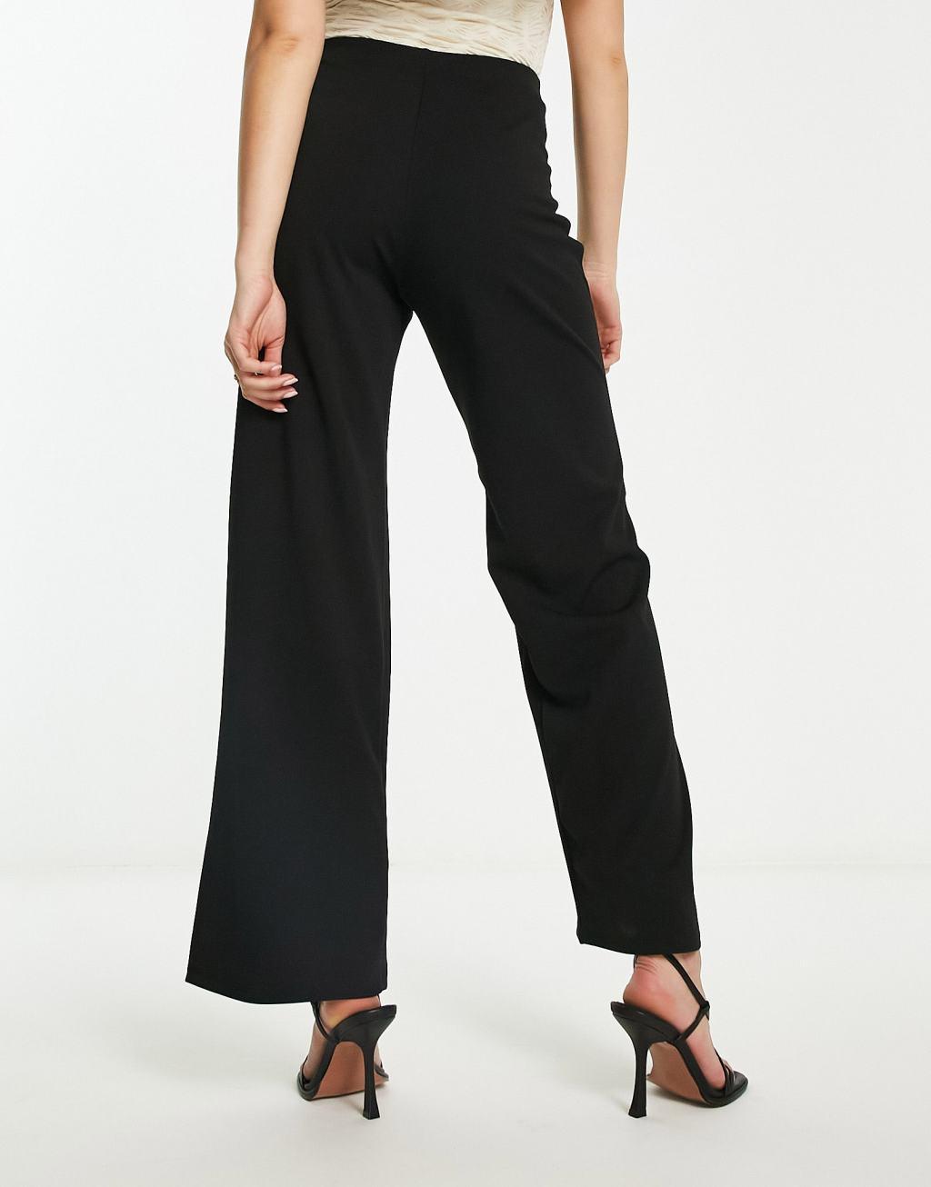 River Island wide leg tailored pants with button detail in black Product Image