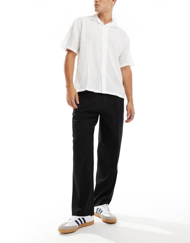 ADPT wide fit pants in black with front pleat     Product Image