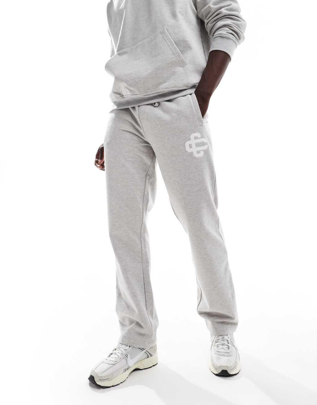 The Couture Club heavyweight emblem sweatpants in gray - part of a set Product Image