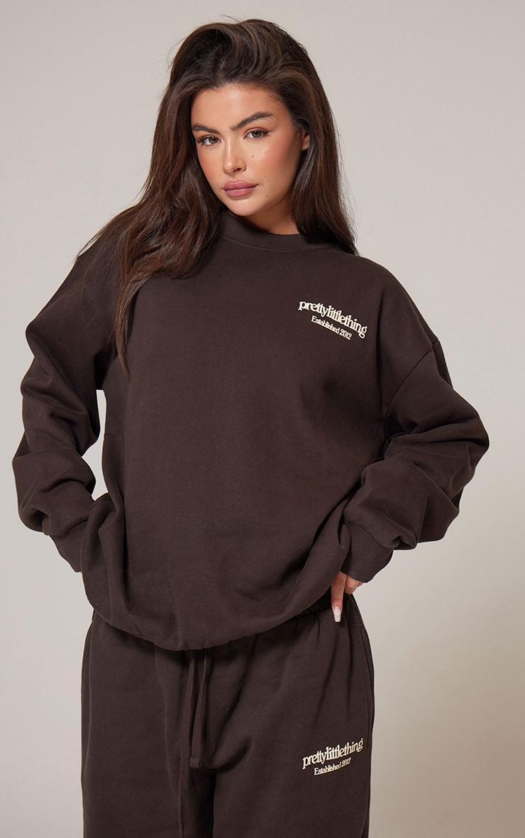 PRETTYLITTLETHING Chocolate Premium Print Oversized Sweatshirt Product Image