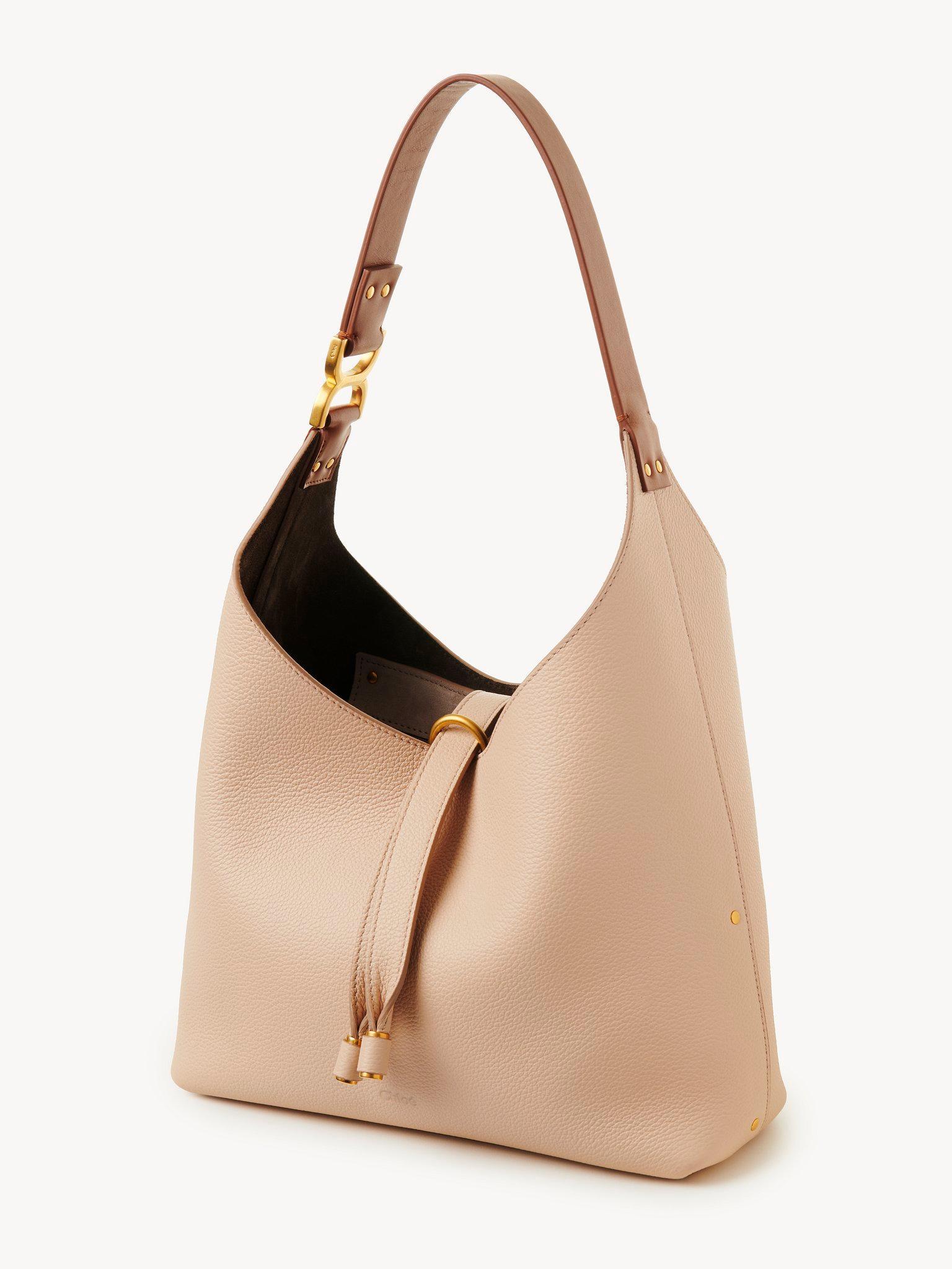 Small Marcie hobo bag in grained leather Product Image