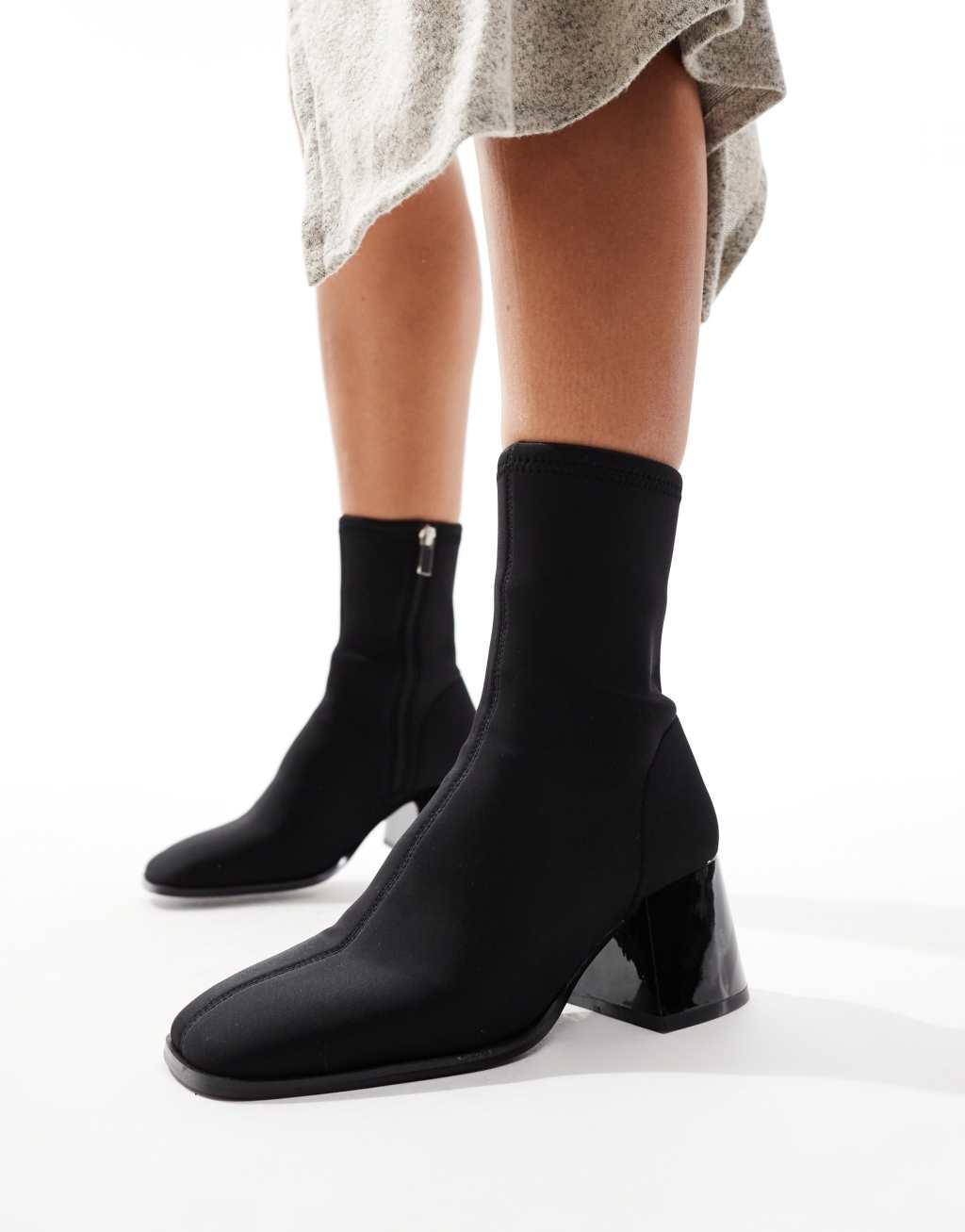 ASOS DESIGN Radiant flared block heel boots in black neoprene Product Image