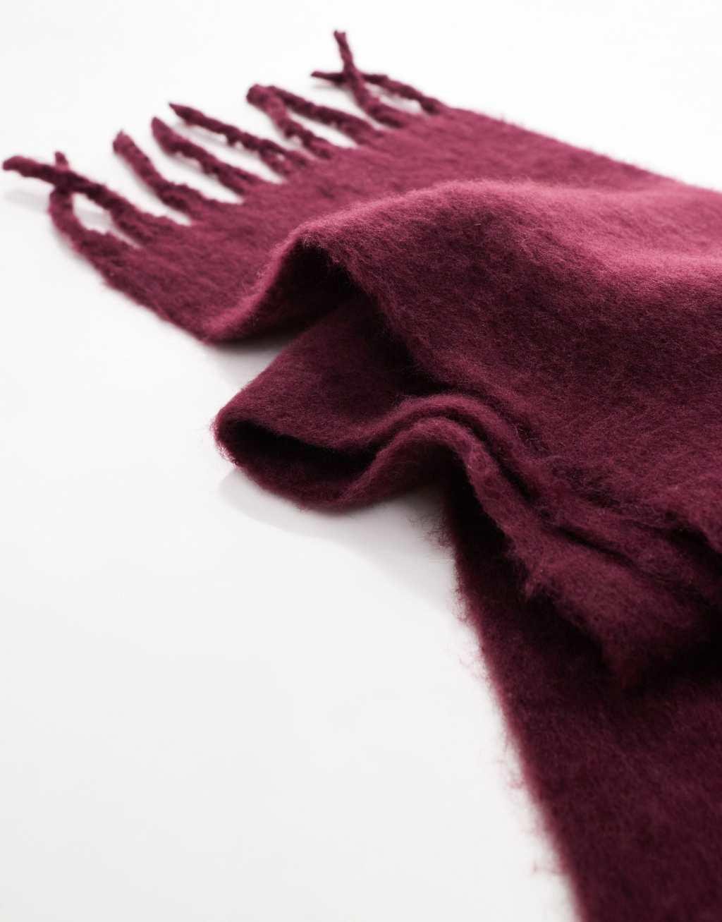 ASOS DESIGN fluffy tassel scarf in burgundy Product Image