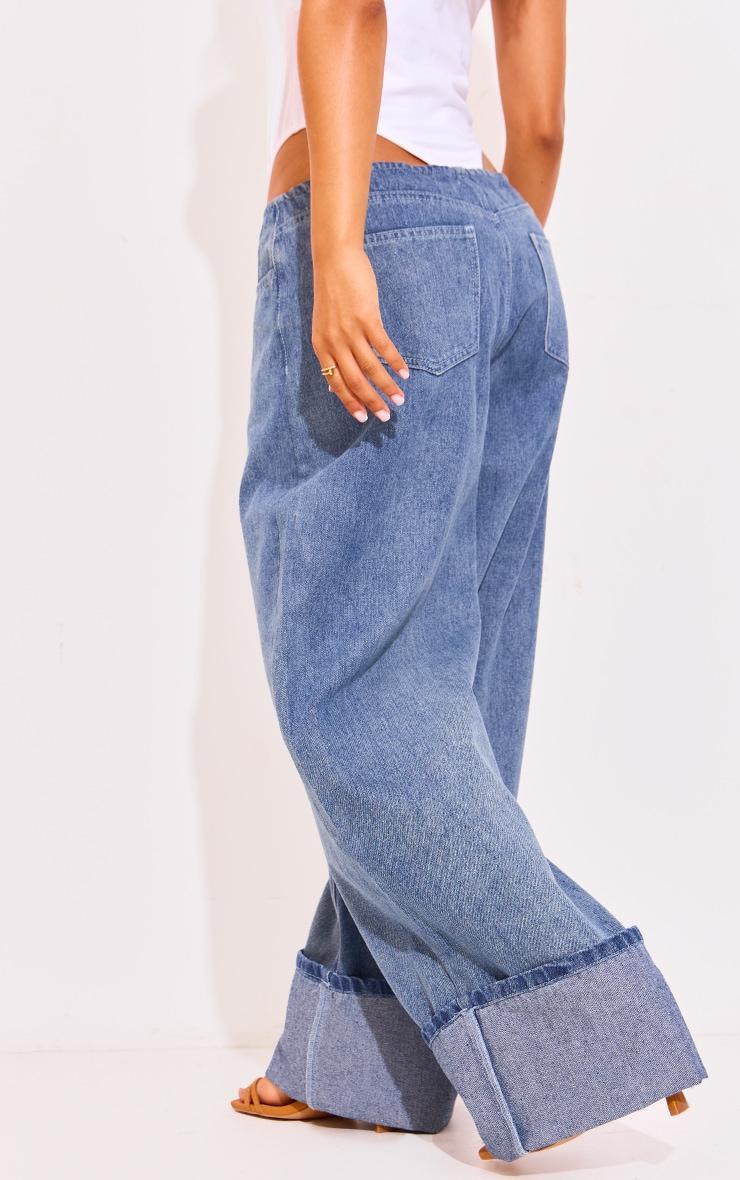 Petite Light Blue Wash Denim Turn Up Low Rise Wide Leg Jeans Product Image