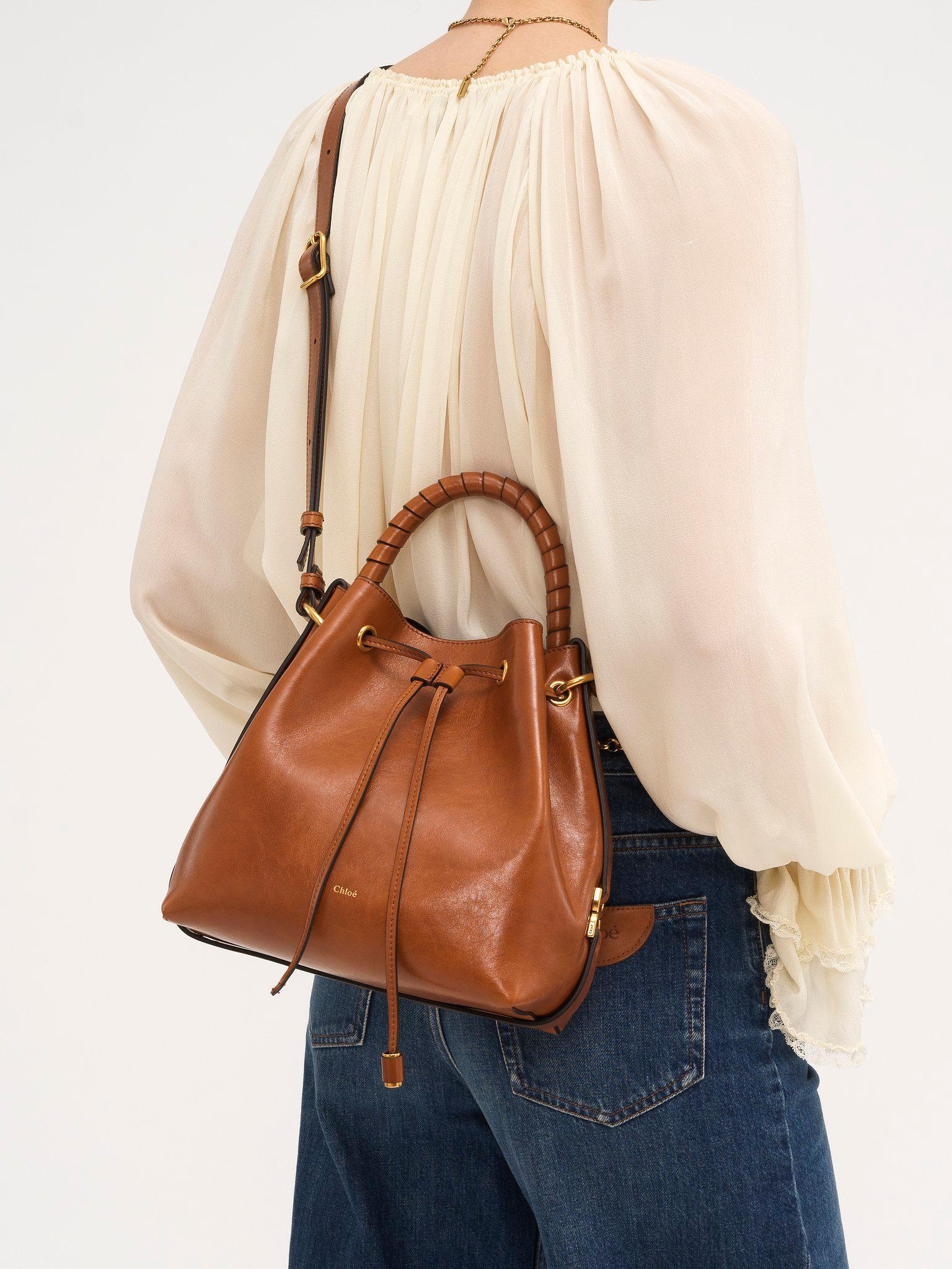 Marcie bucket bag in shiny leather Product Image