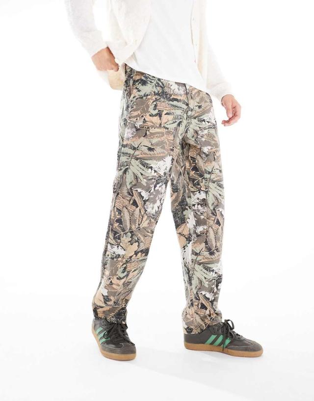 ONLY & SONS loose fit pants in beige leaf camo Product Image