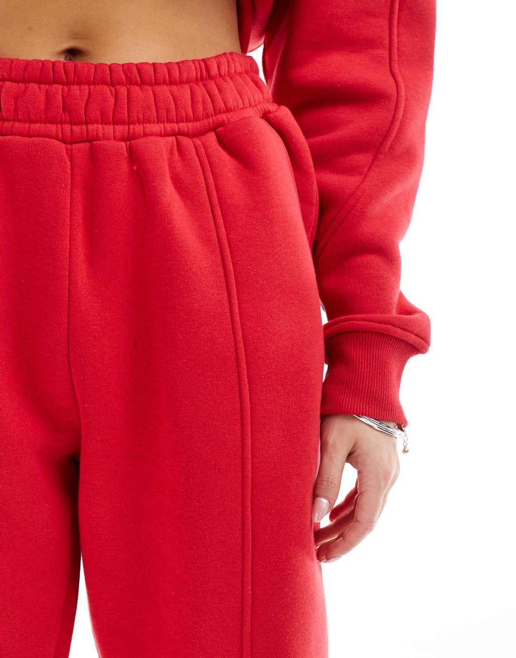 Murci exclusive saint motif sweatpants in red - part of a set Product Image