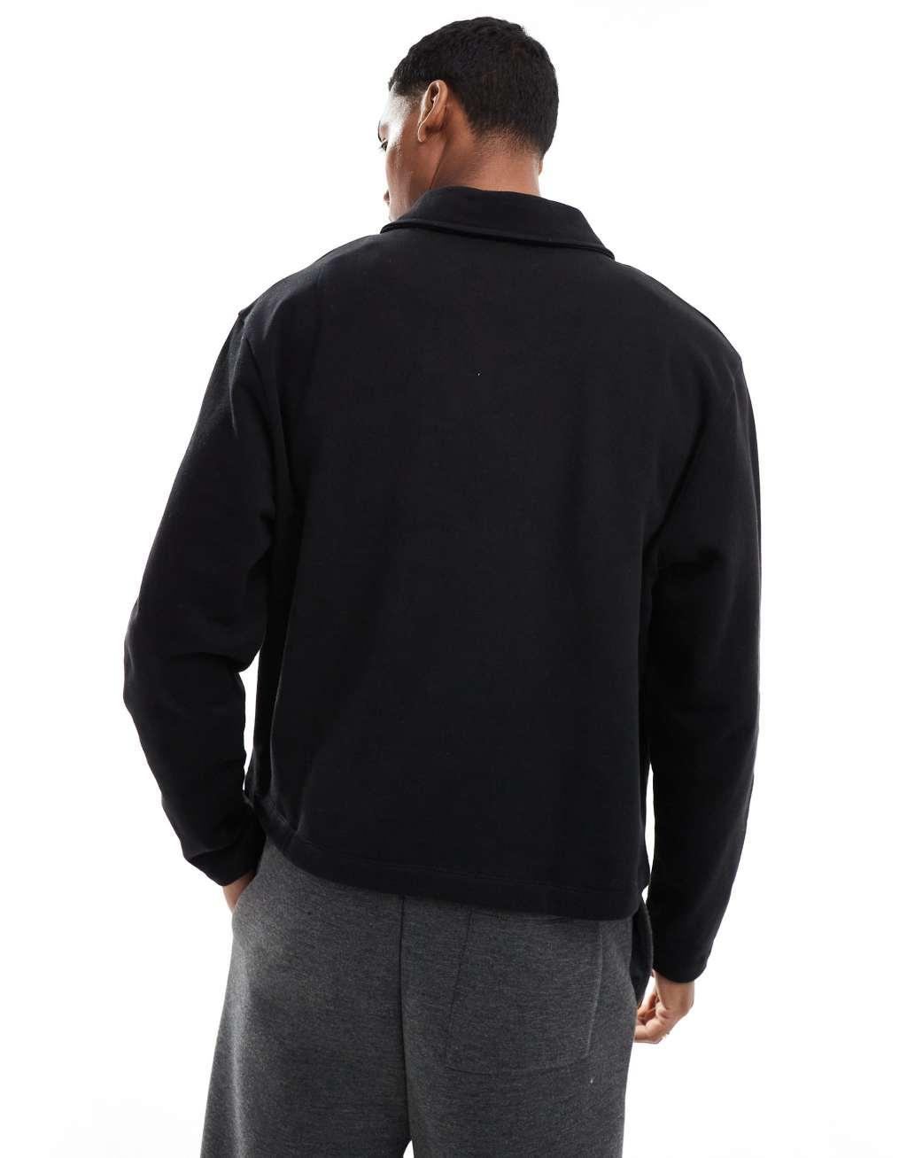 ASOS DESIGN boxy oversized polo sweatshirt in black Product Image