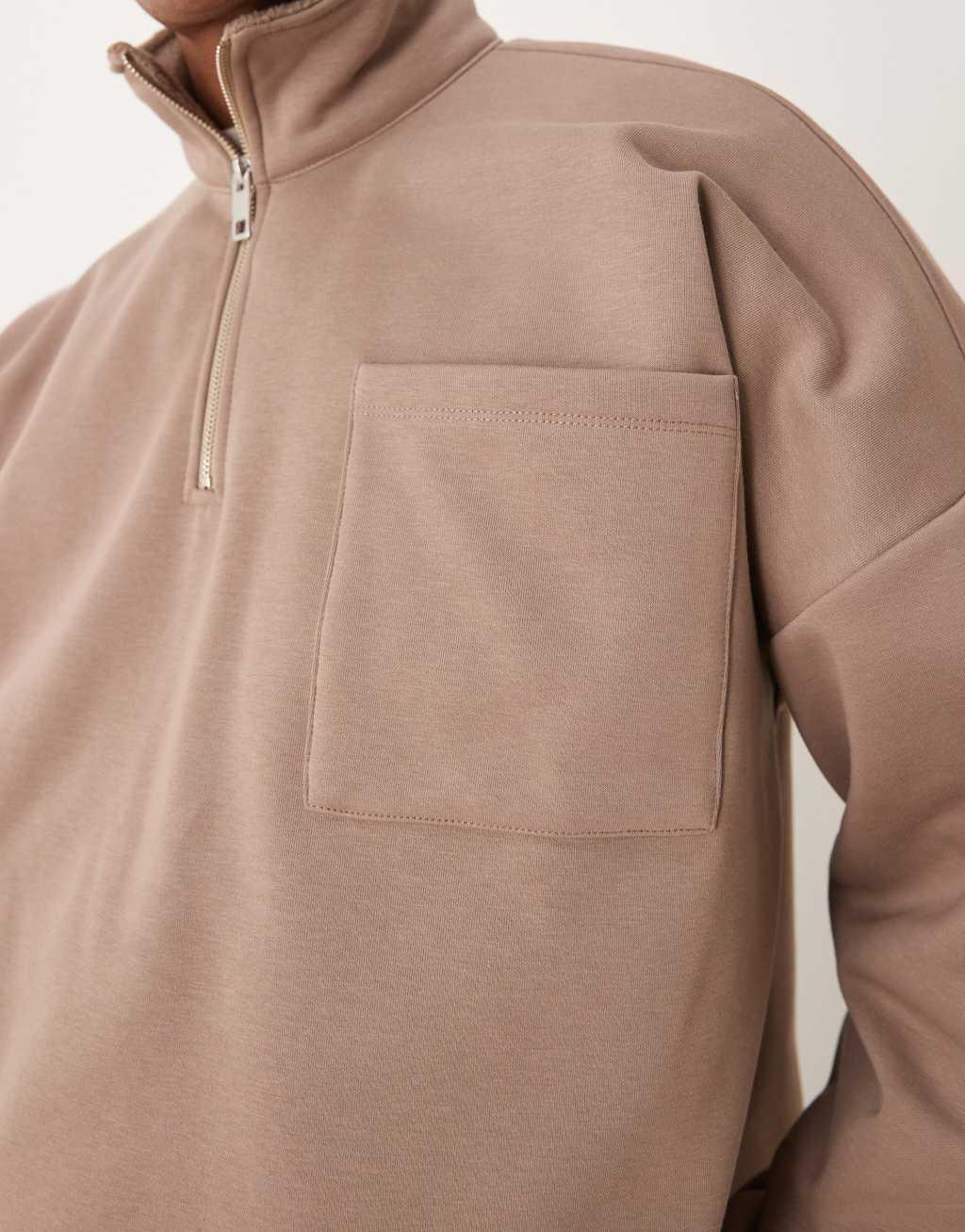 ASOS DESIGN oversized dropped shoulder borg lined funnel neck sweatshirt in brown Product Image