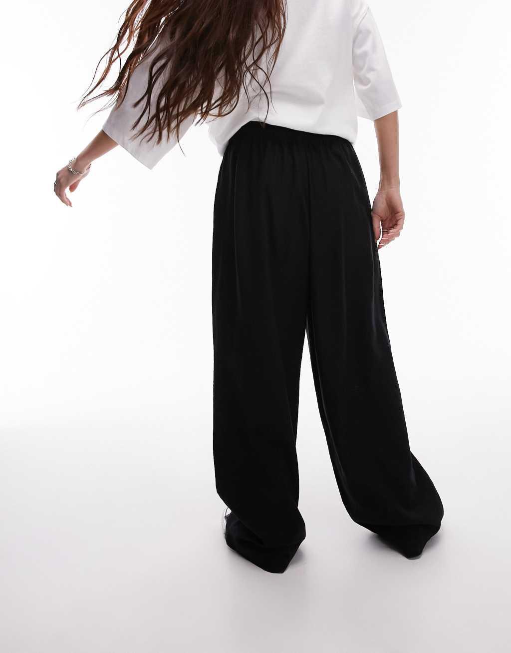 Topshop linen blend balloon pants in black Product Image