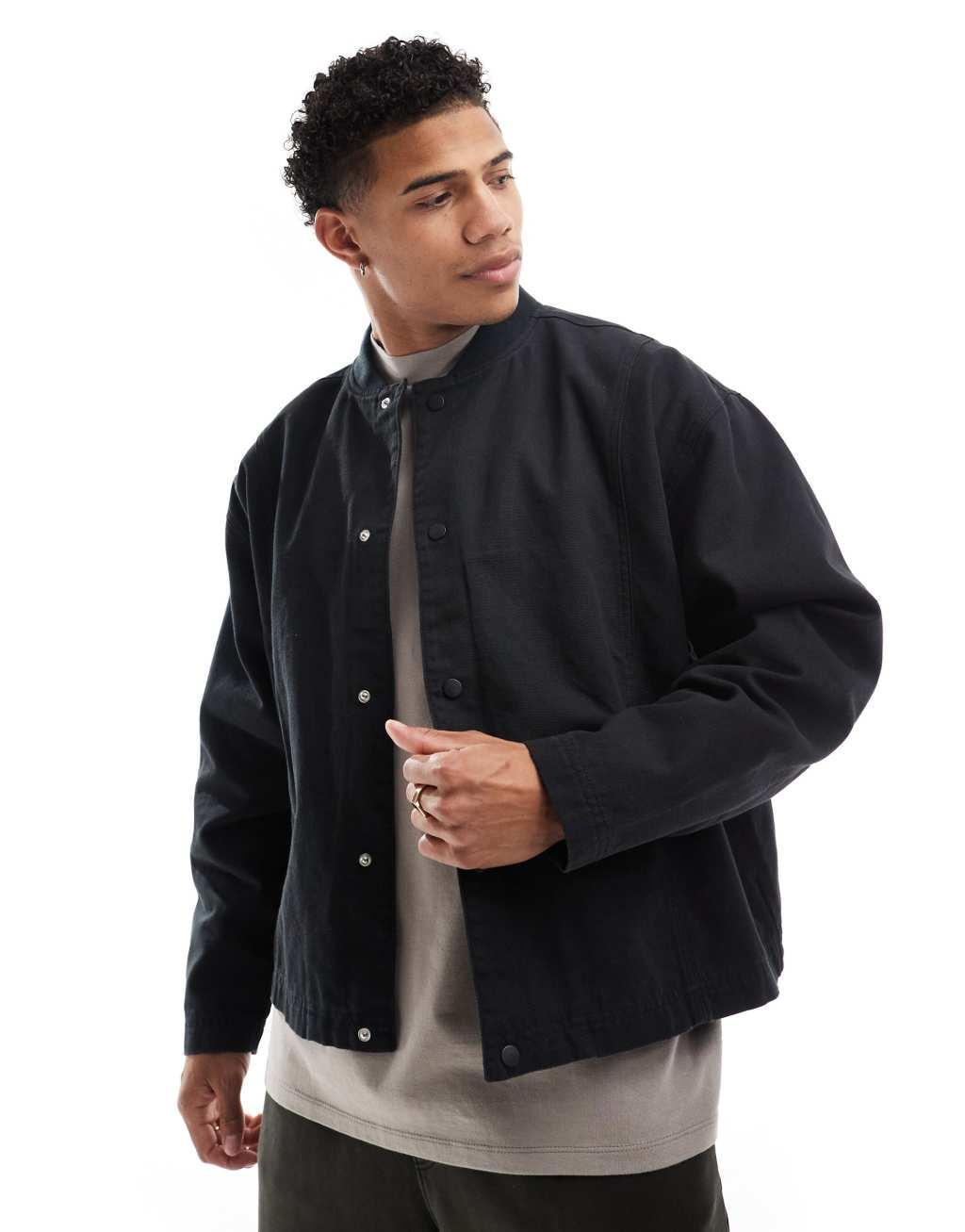 ASOS DESIGN oversized cropped washed coach jacket in black Product Image