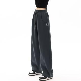 Mid-Waist Drawstring Pocketed Wide-Leg Plain Sweatpants Product Image