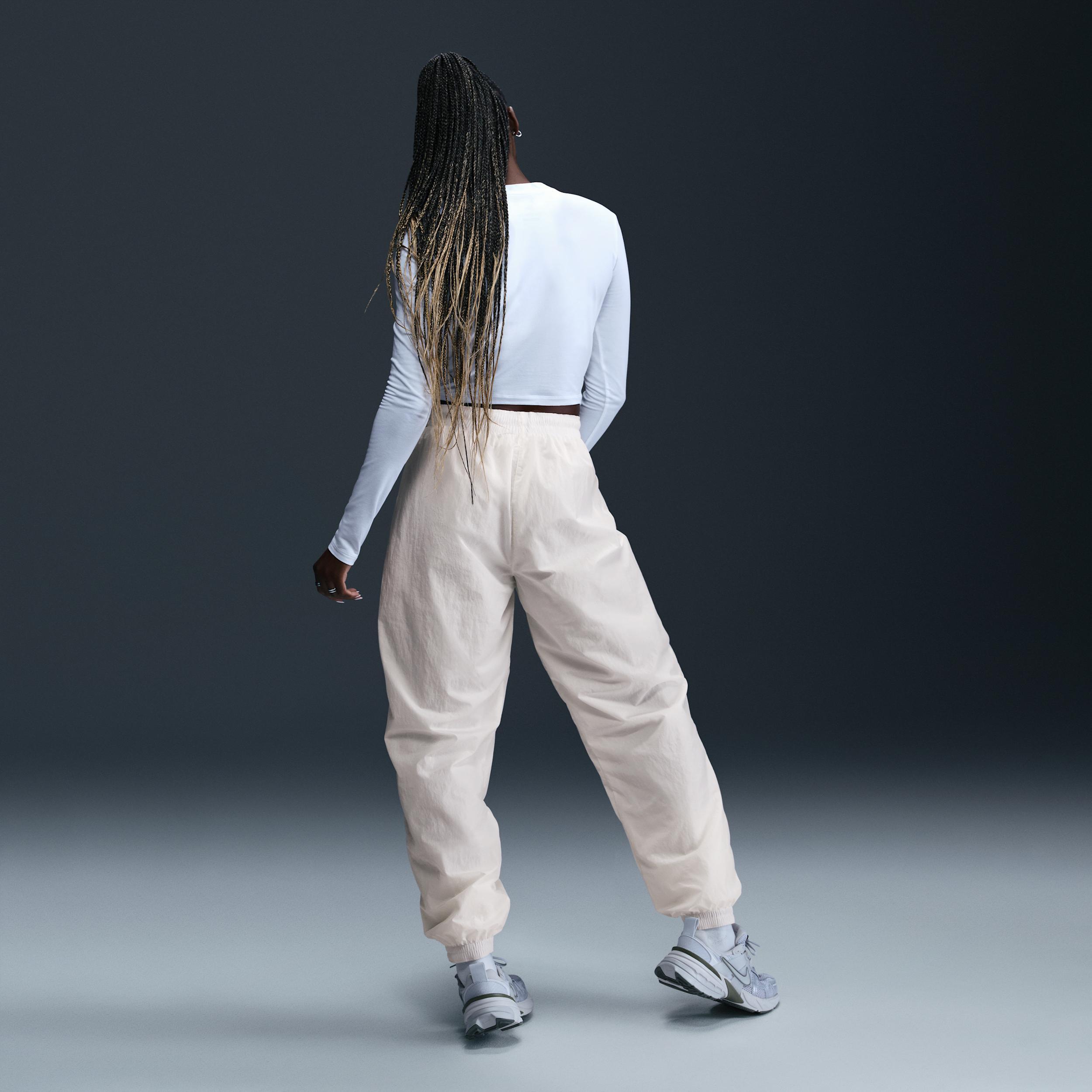 Women's Nike Sportswear Essential Mid-Rise Oversized Woven Jogger Pants Product Image