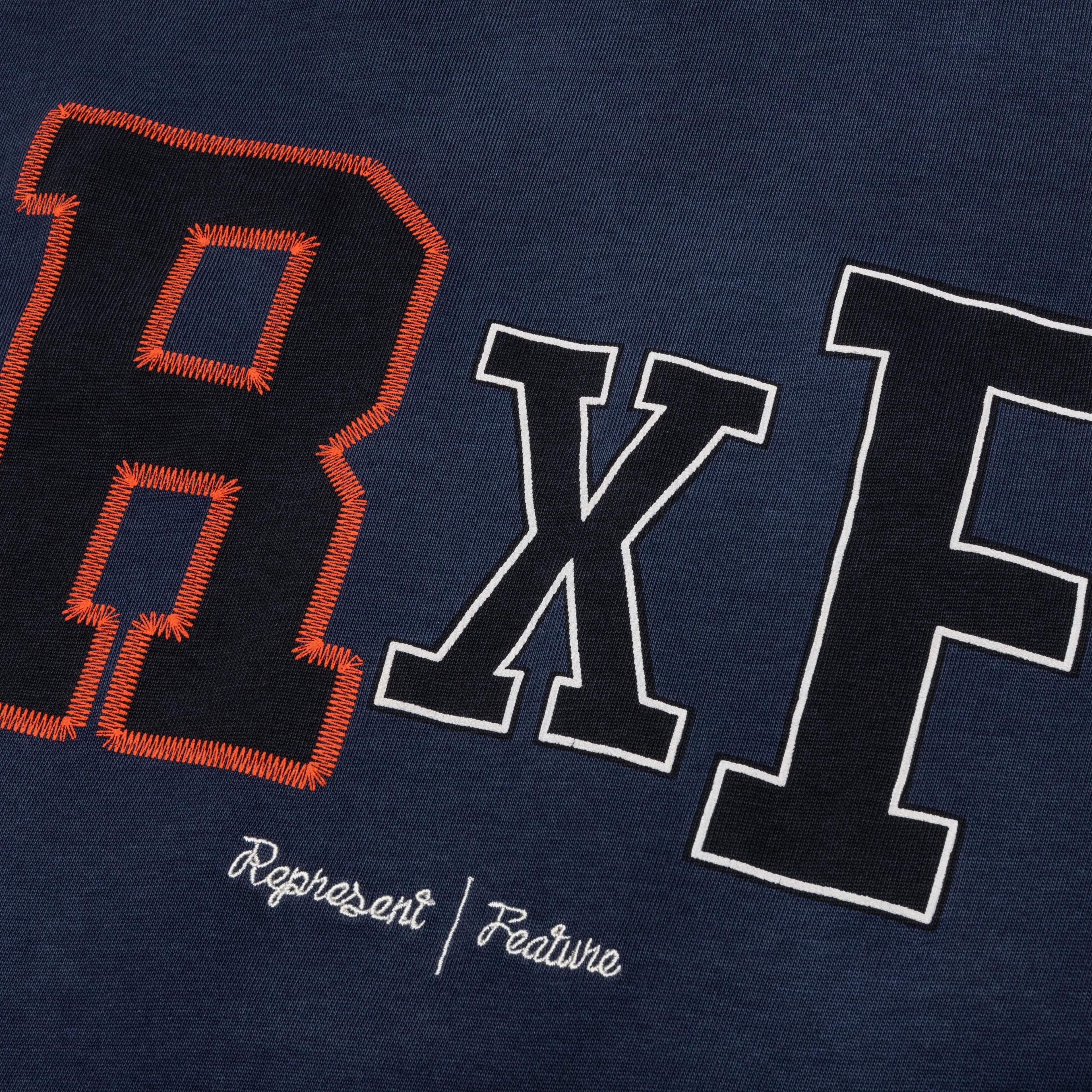 Feature x Represent Champions T-Shirt - Midnight Navy Male Product Image