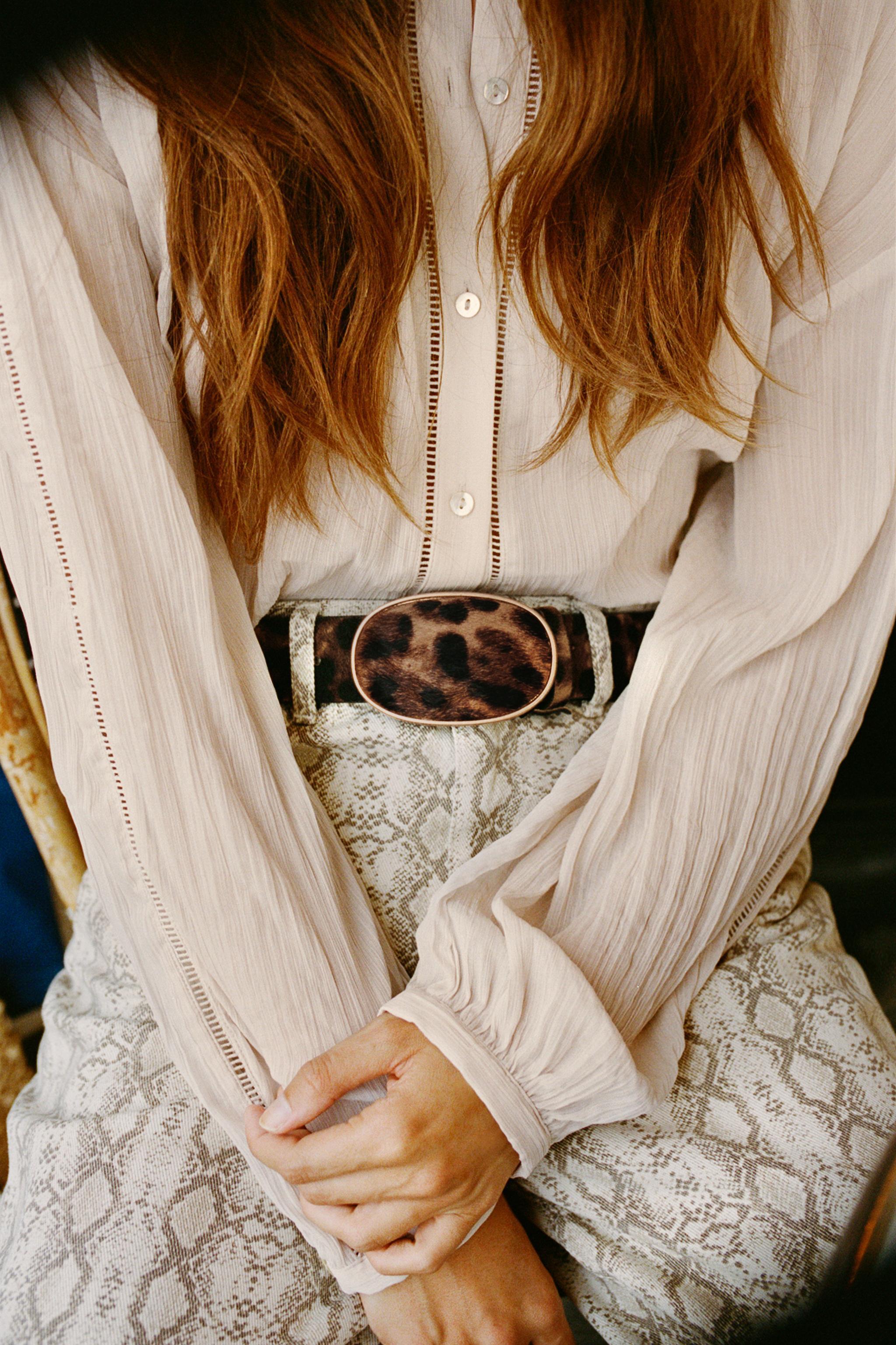 LEATHER BELT WITH ANIMAL PRINT BUCKLE Product Image