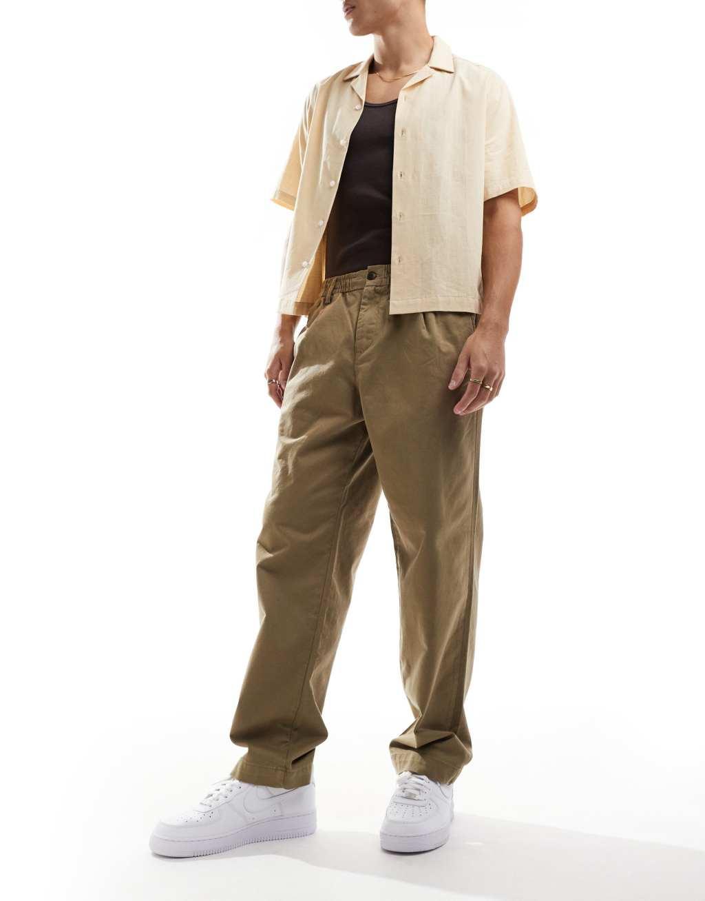 Jack & Jones loose fit pull on chino with pleated front in beige Product Image