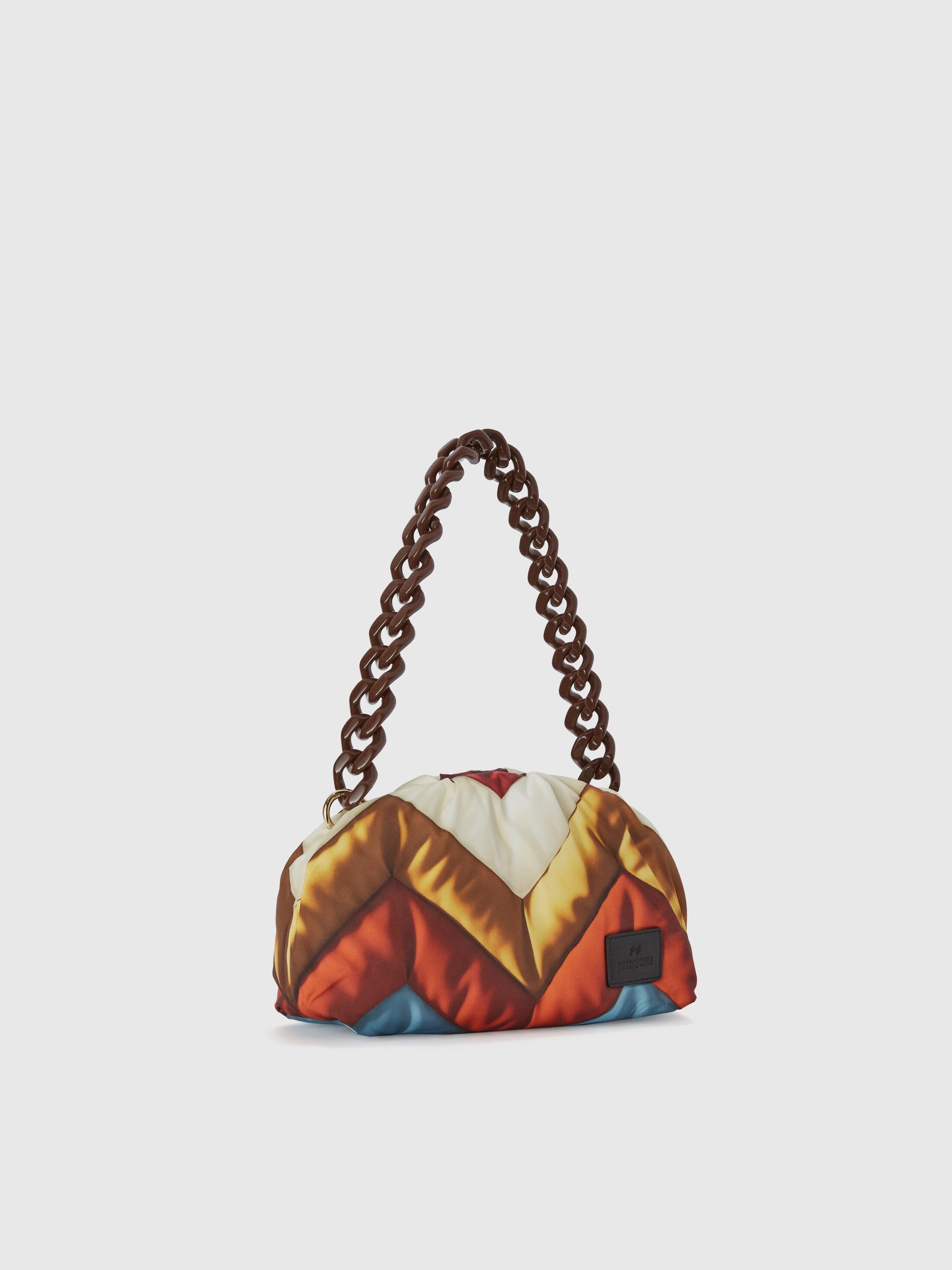 Zig zag fabric clutch with resin shoulder strap Product Image