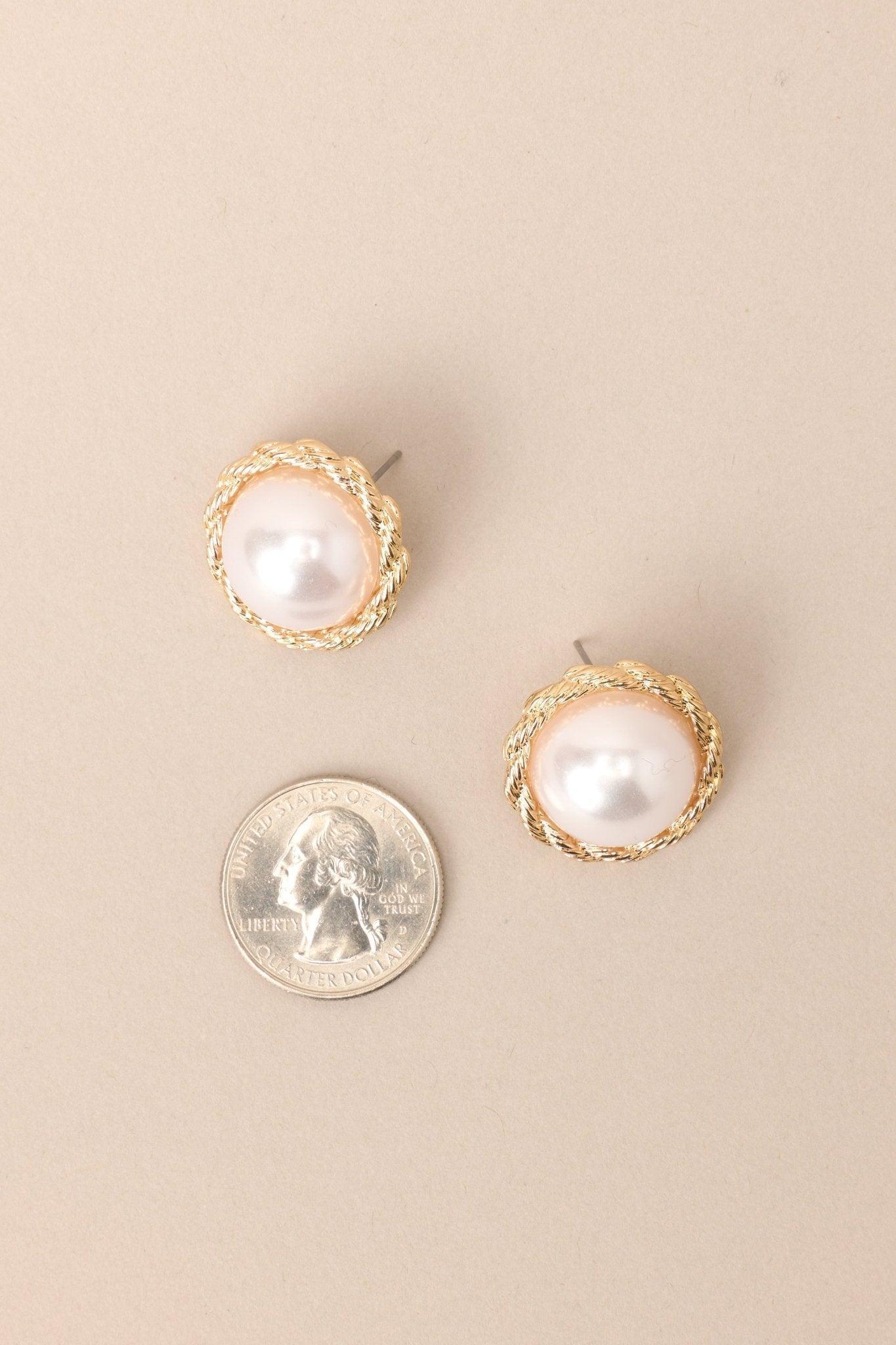 Peaceful Mind Gold and Pearl Stud Earrings Product Image