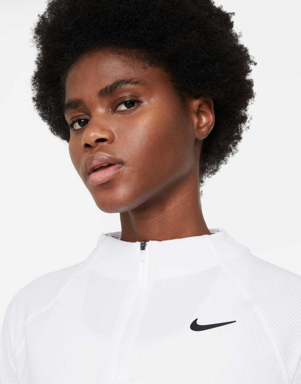 Nike Tennis Victory Dri-FIT long sleeve half-zip top in white Product Image