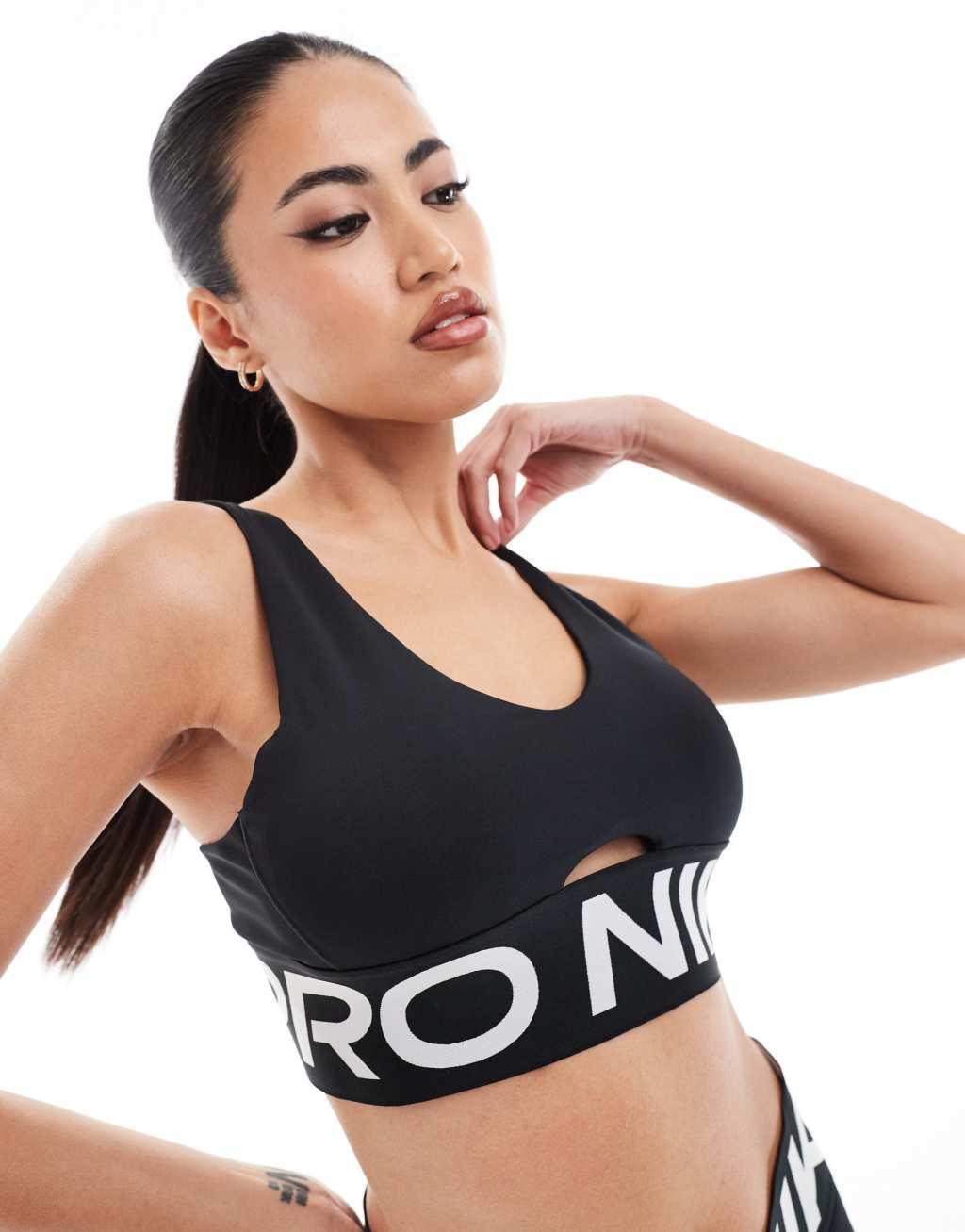 Nike Training Pro Indy medium support plunge sports bra in black Product Image