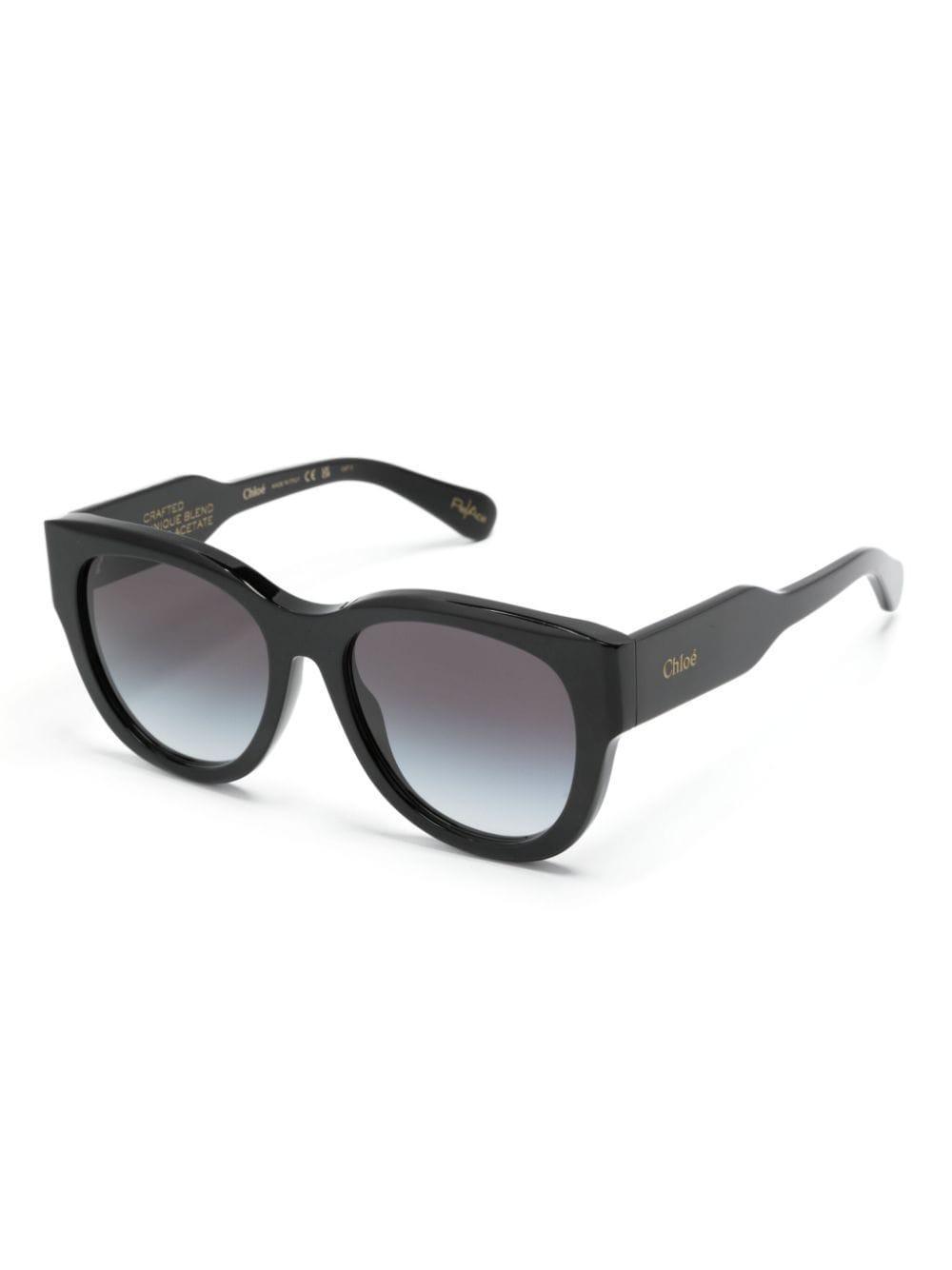 Logo-print Round-frame Sunglasses In Schwarz Product Image