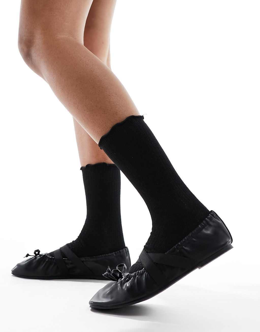 Vero Moda ribbed glitter sock with frill edge in black Product Image