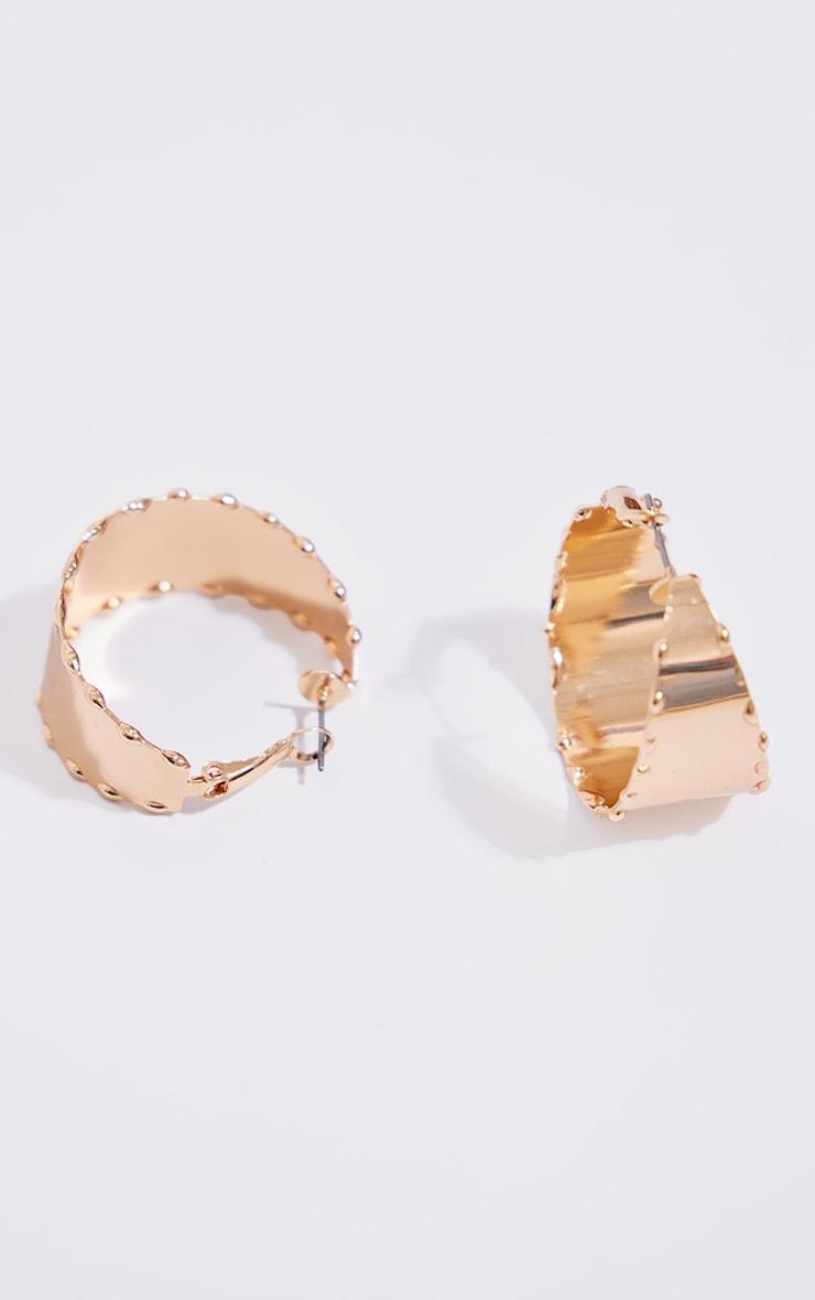 Gold Flared Texture Hoop Earrings Product Image