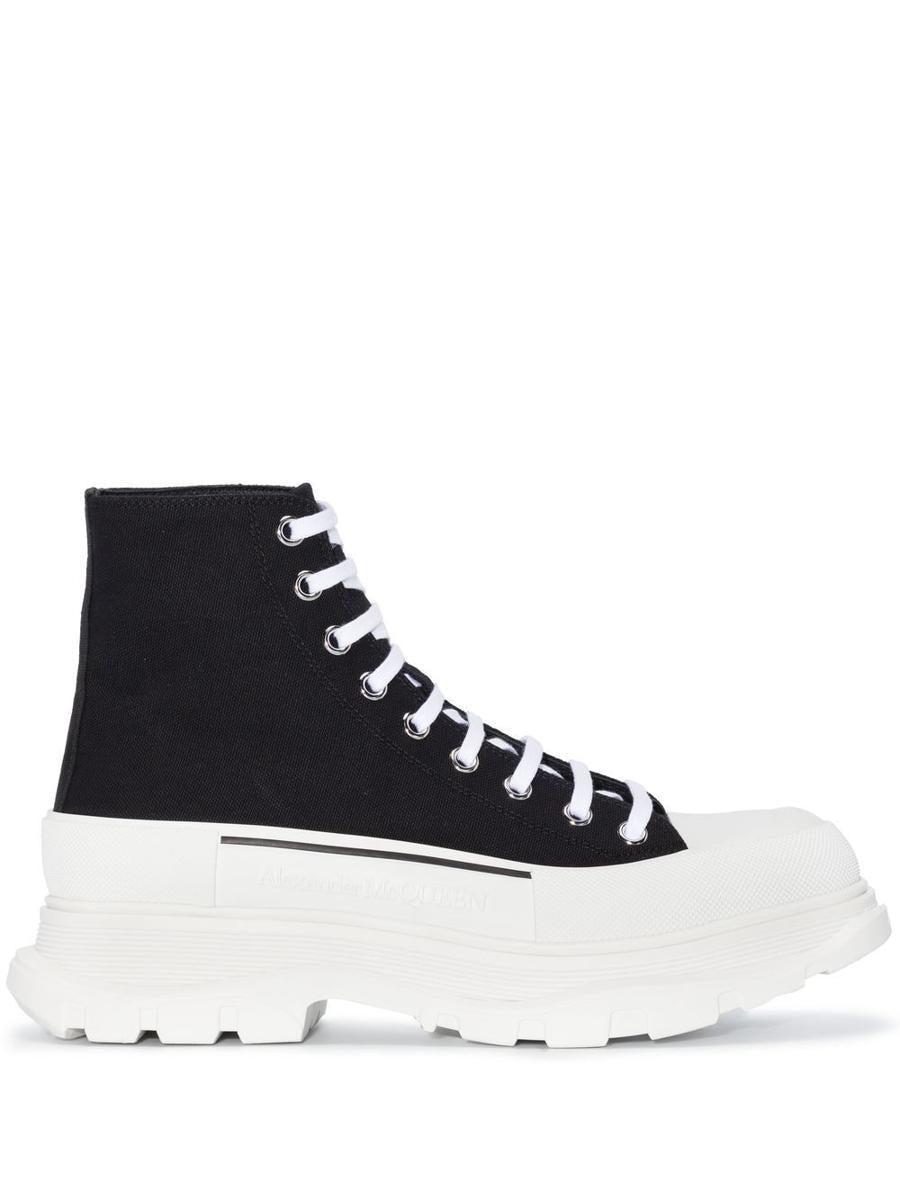 Black And White Tread Slick Ankle Boots In Multicolor Product Image