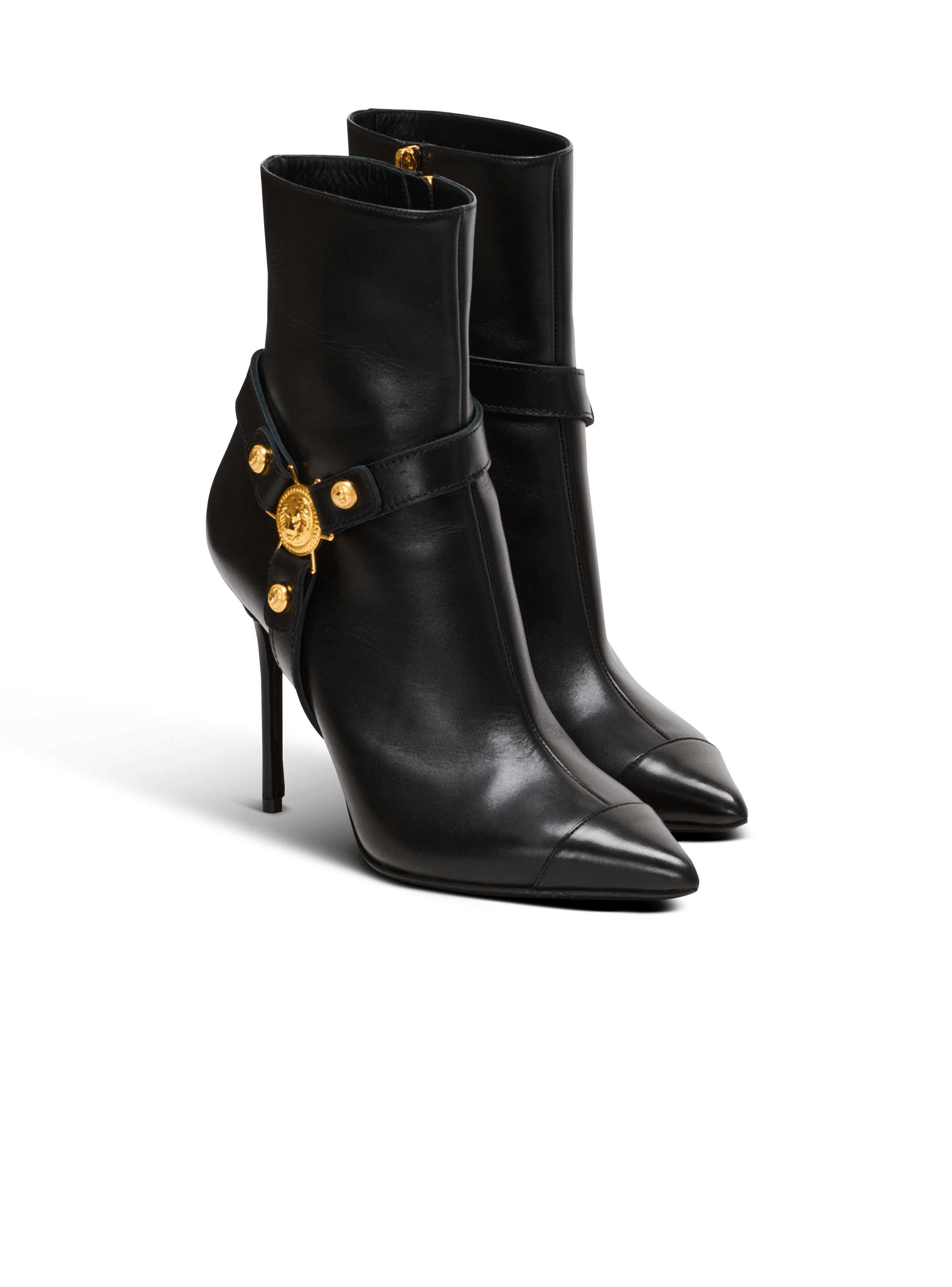 Heeled calfskin Eva ankle boots Product Image