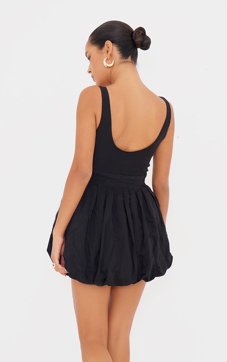 Black Textured Buckle Strap Puffball Dress Product Image