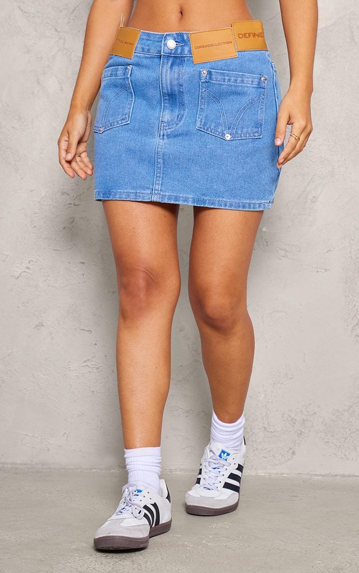 Petite Mid Blue Wash Denim Low Rise Badge Detail Mini Skirt Product Image