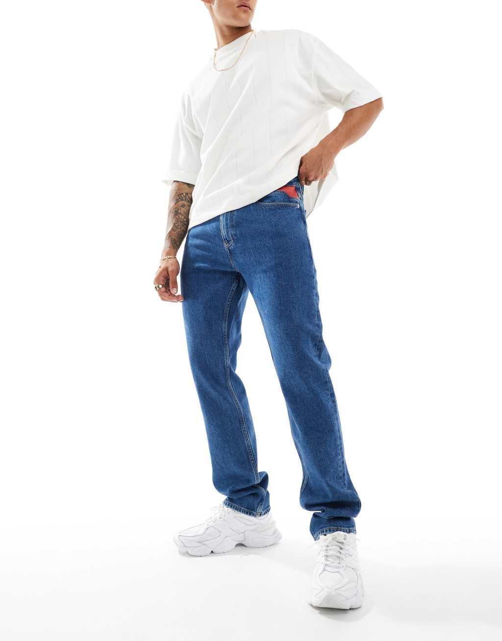 Tommy Jeans Ryan regular straight jeans in mid wash with flag detail Product Image