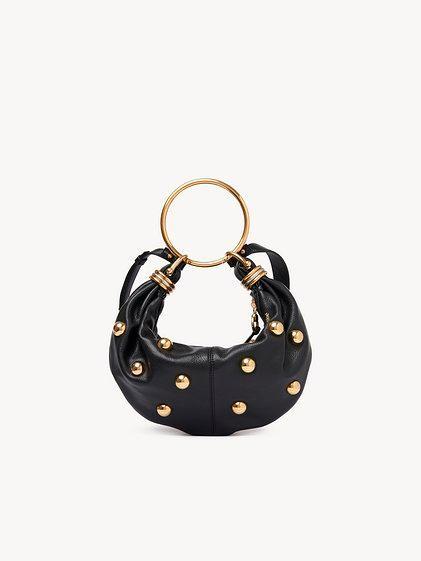 Small Bracelet hobo bag in grained leather with studs Product Image