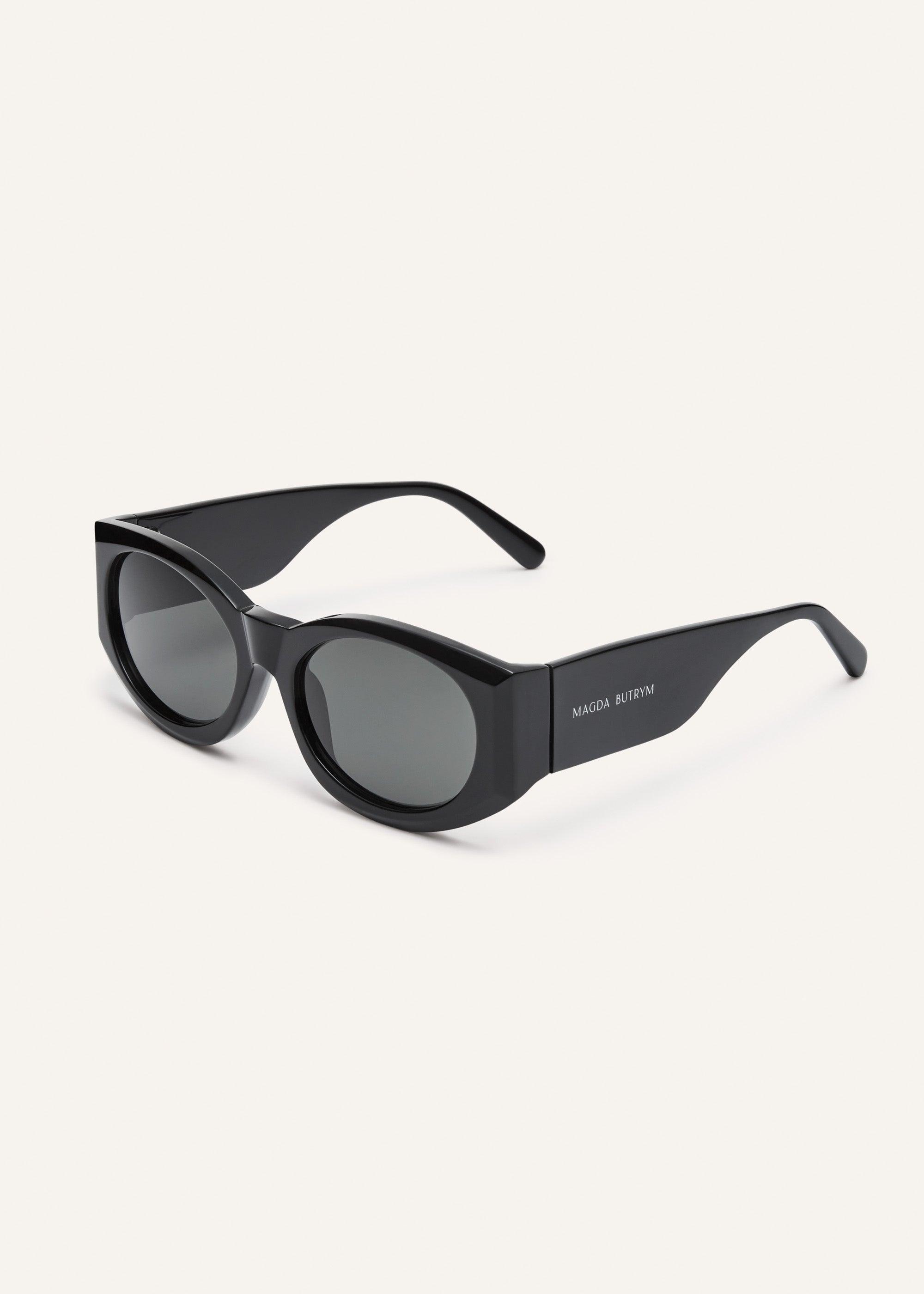 Oval sunglasses in black Product Image