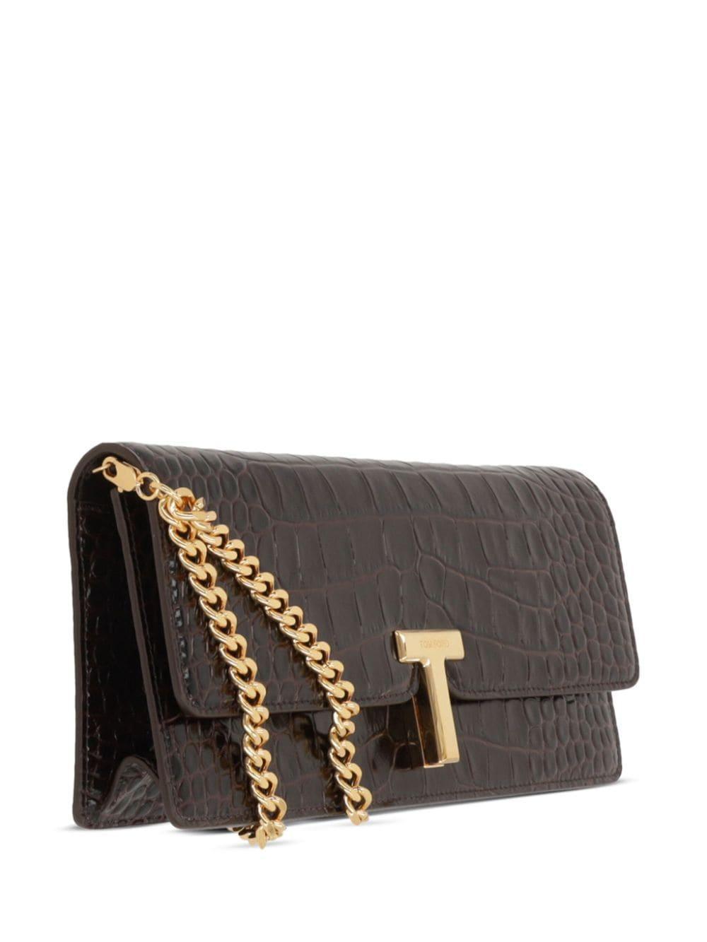 crocodile-embossed leather clutch bag Product Image