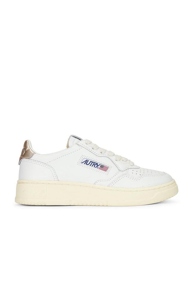 Autry Medalist Sneaker in White & Gold - White. Size 39 (also in ). Product Image