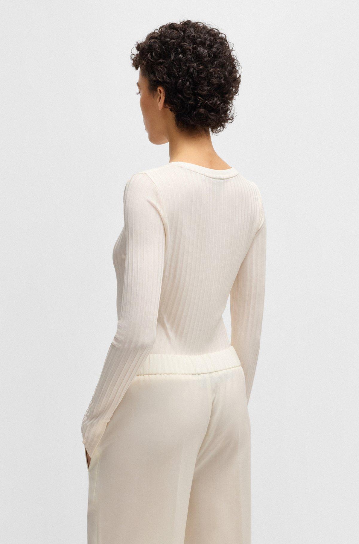 Long-sleeved V-neck top in lustrous ribbed jersey Product Image