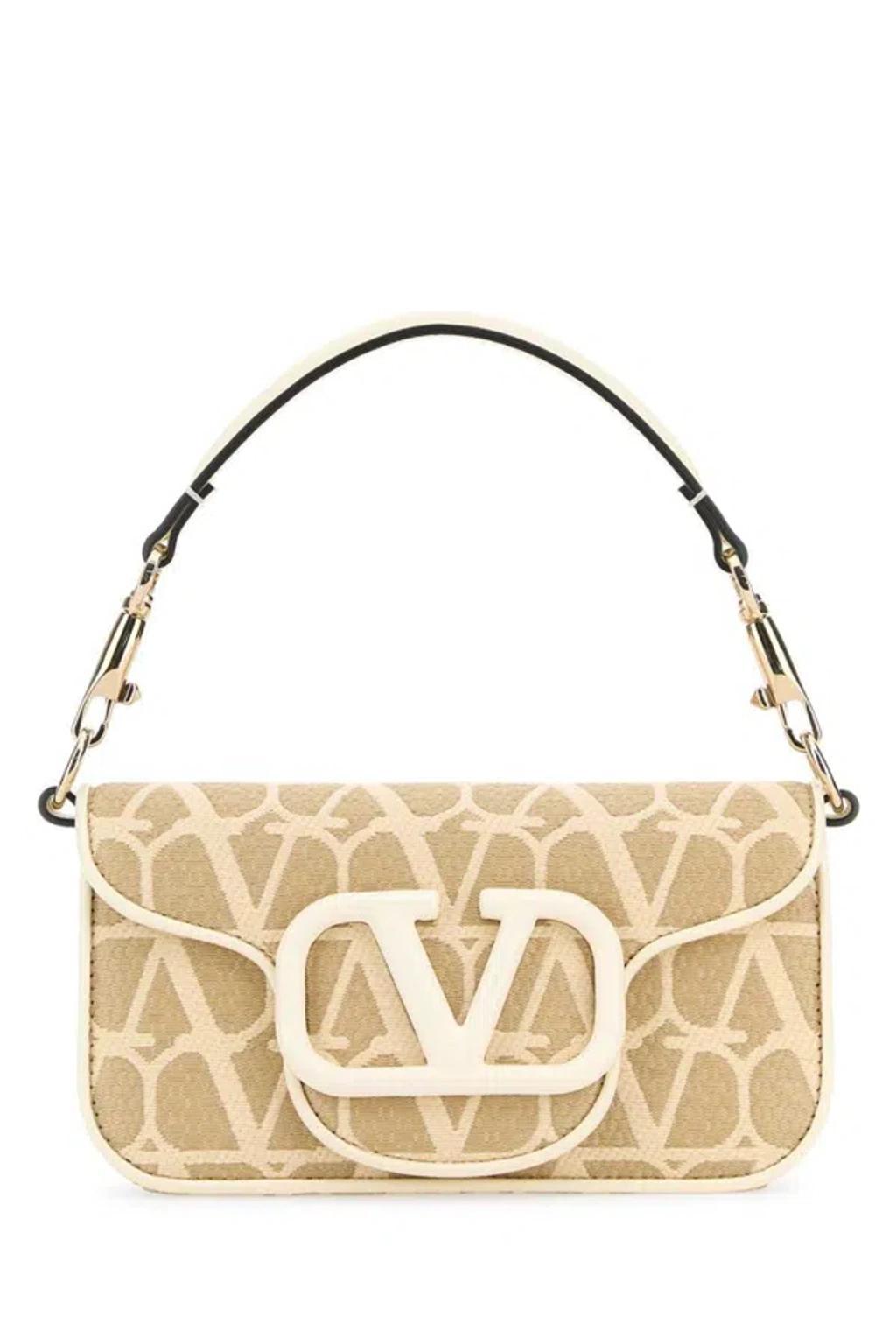 Handbags. In Beige product image