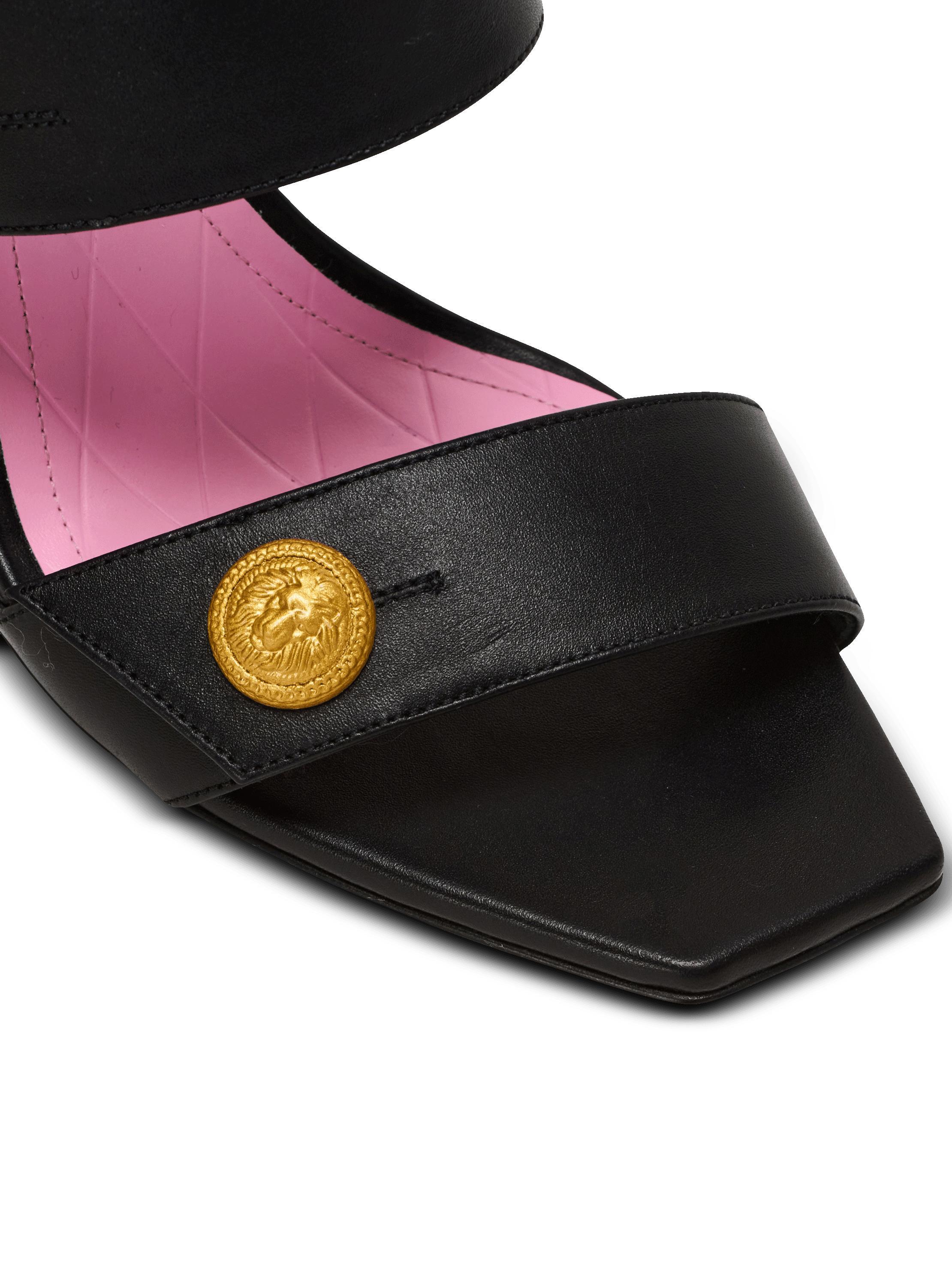 Heeled Eva mules in calfskin Product Image