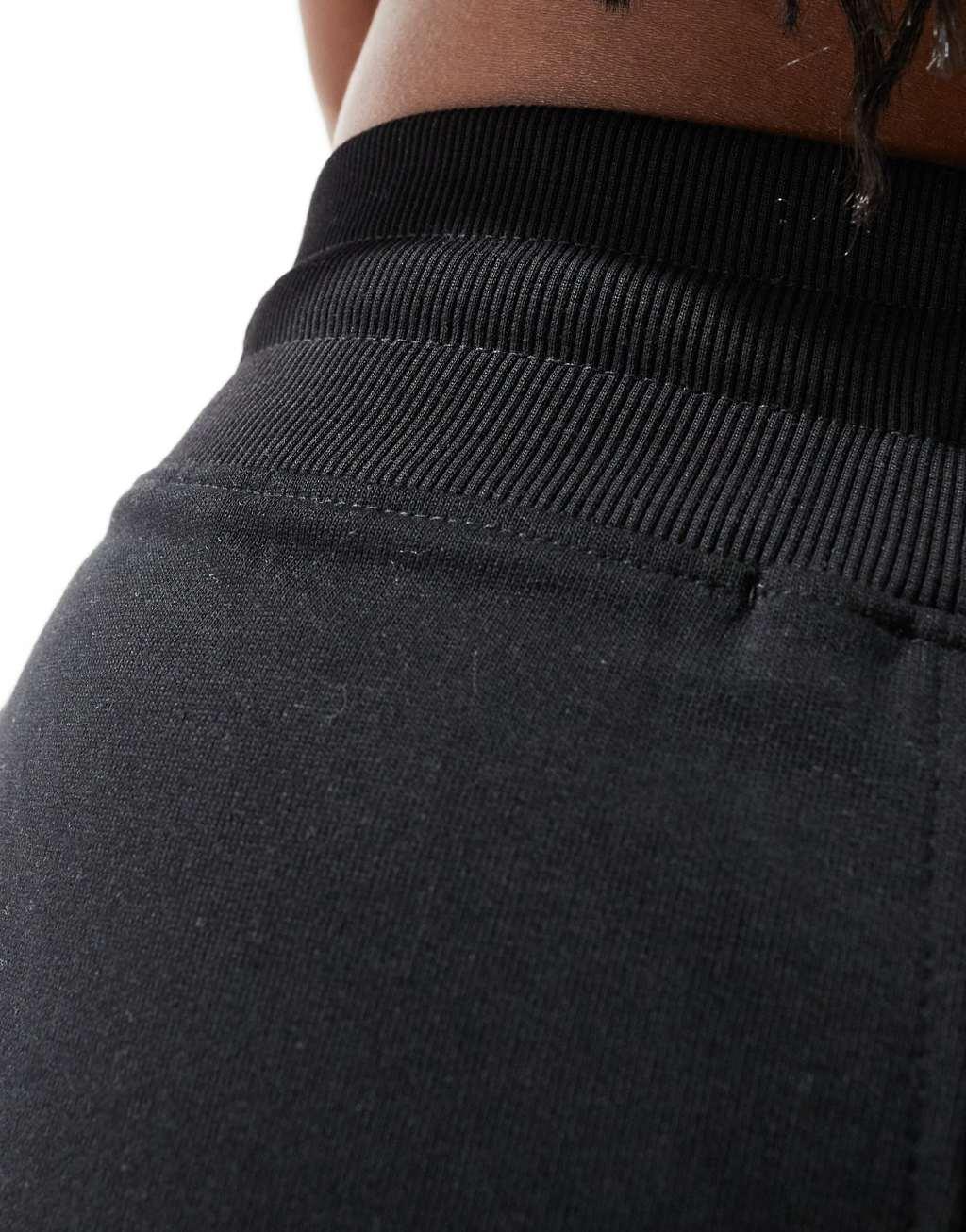 Kaiia drawstring wide leg sweatpants in black Product Image