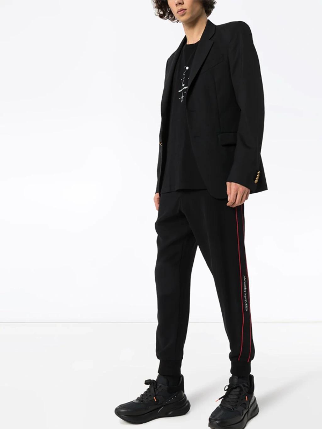 Logo Tape Track Pants In Black Product Image