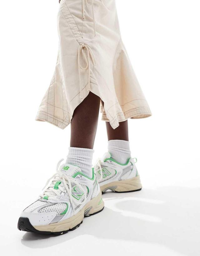 New Balance 530 sneakers in white and green  Product Image