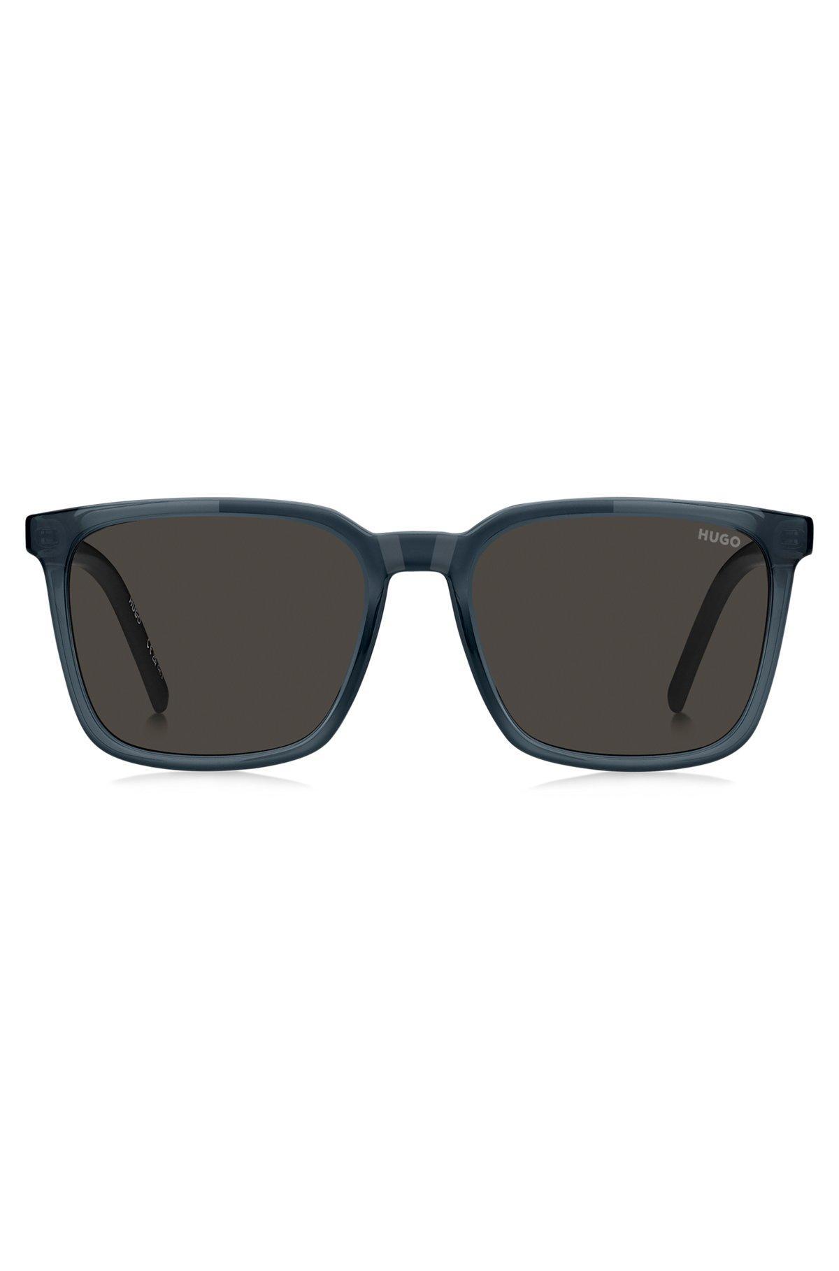 Blue sunglasses with textured temples Product Image