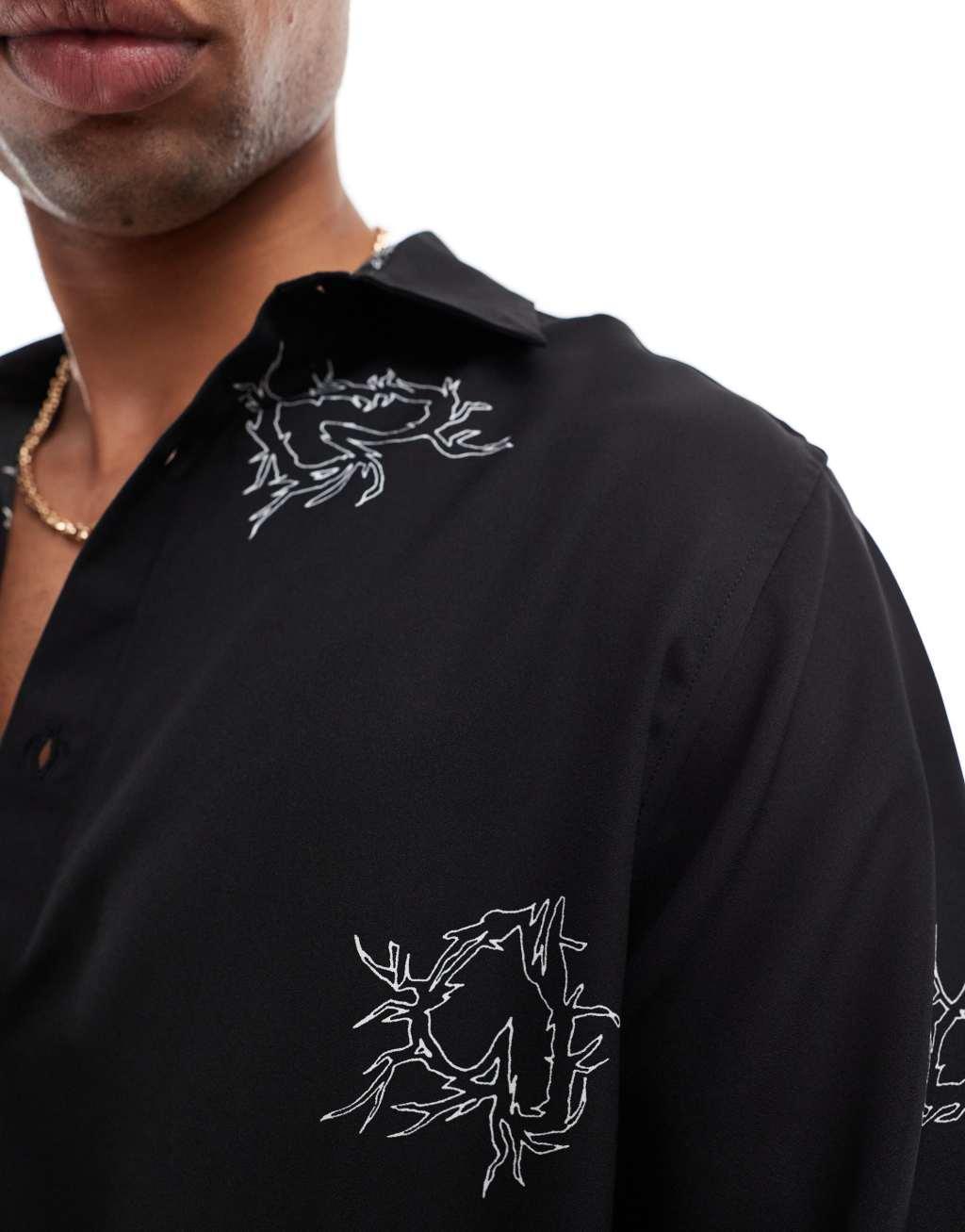 ASOS DESIGN relaxed shirt with heart print in black Product Image