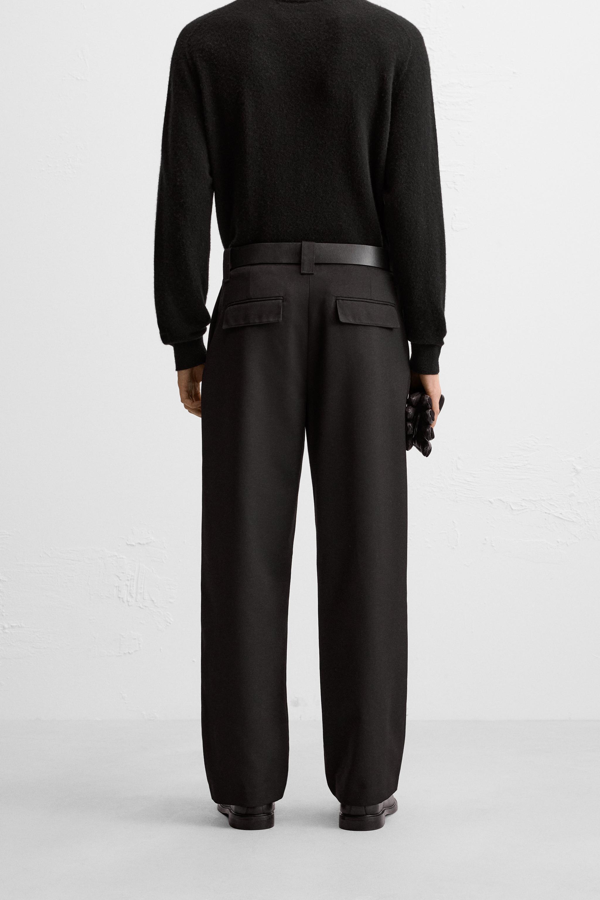 PLEATED PANTS WITH BELT Product Image